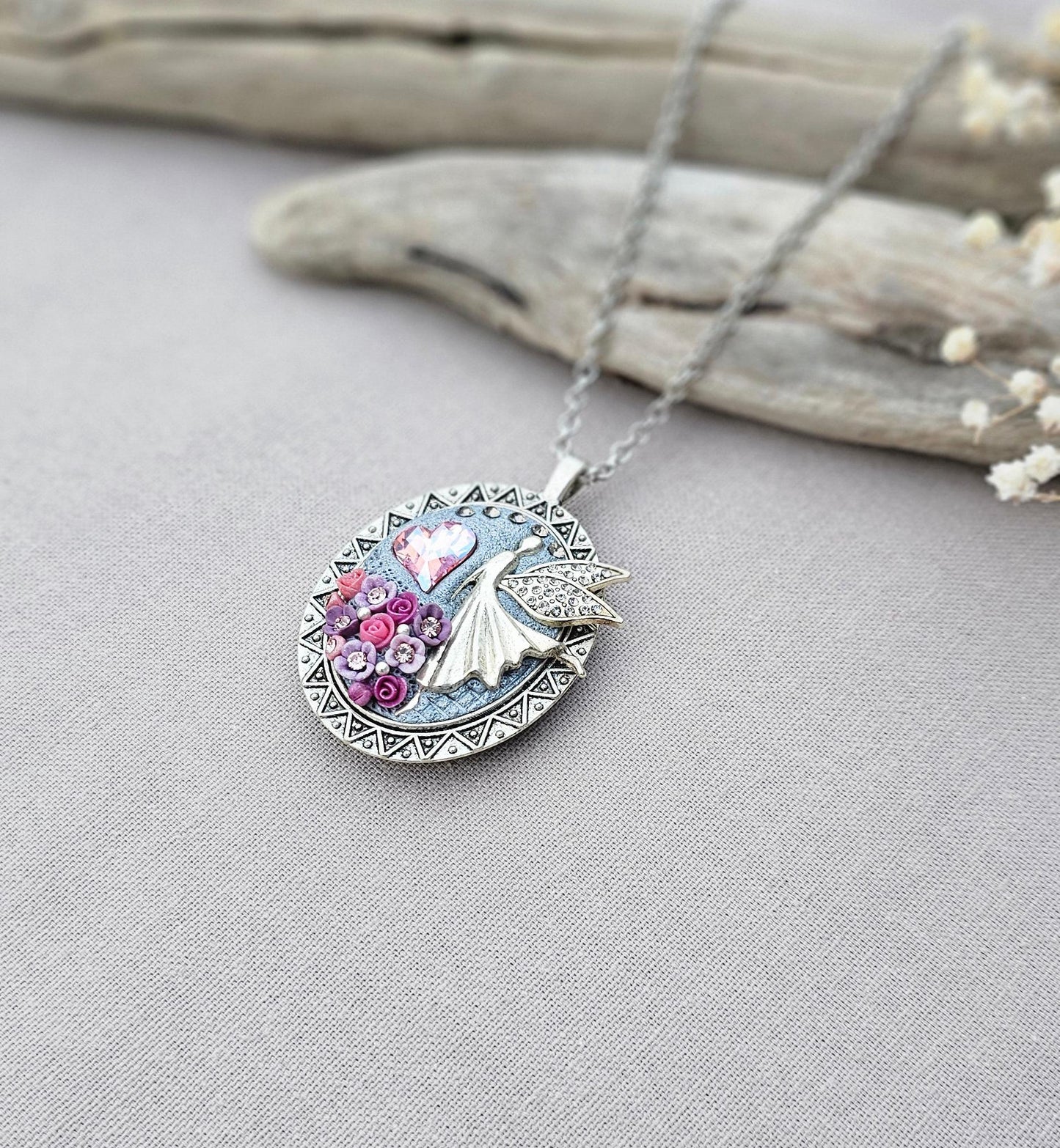 lavender fairy pendant, soft pink locket, fairy jewelry, silver chain necklace, photo locket, aromatic locket, handcrafted flowers, unique gift, whimsical charm, magical necklace, elegant jewelry, fairy tale locket, polymer clay pendant