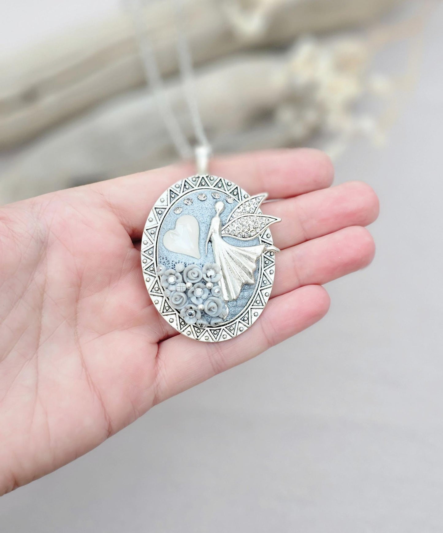 white fairy pendant, classic locket, elegant necklace, floral jewelry, fairy tale charm, personal locket, keepsake jewelry, romantic gift, unique locket, silver chain necklace, handcrafted pendant, mystical charm, serene jewelry
