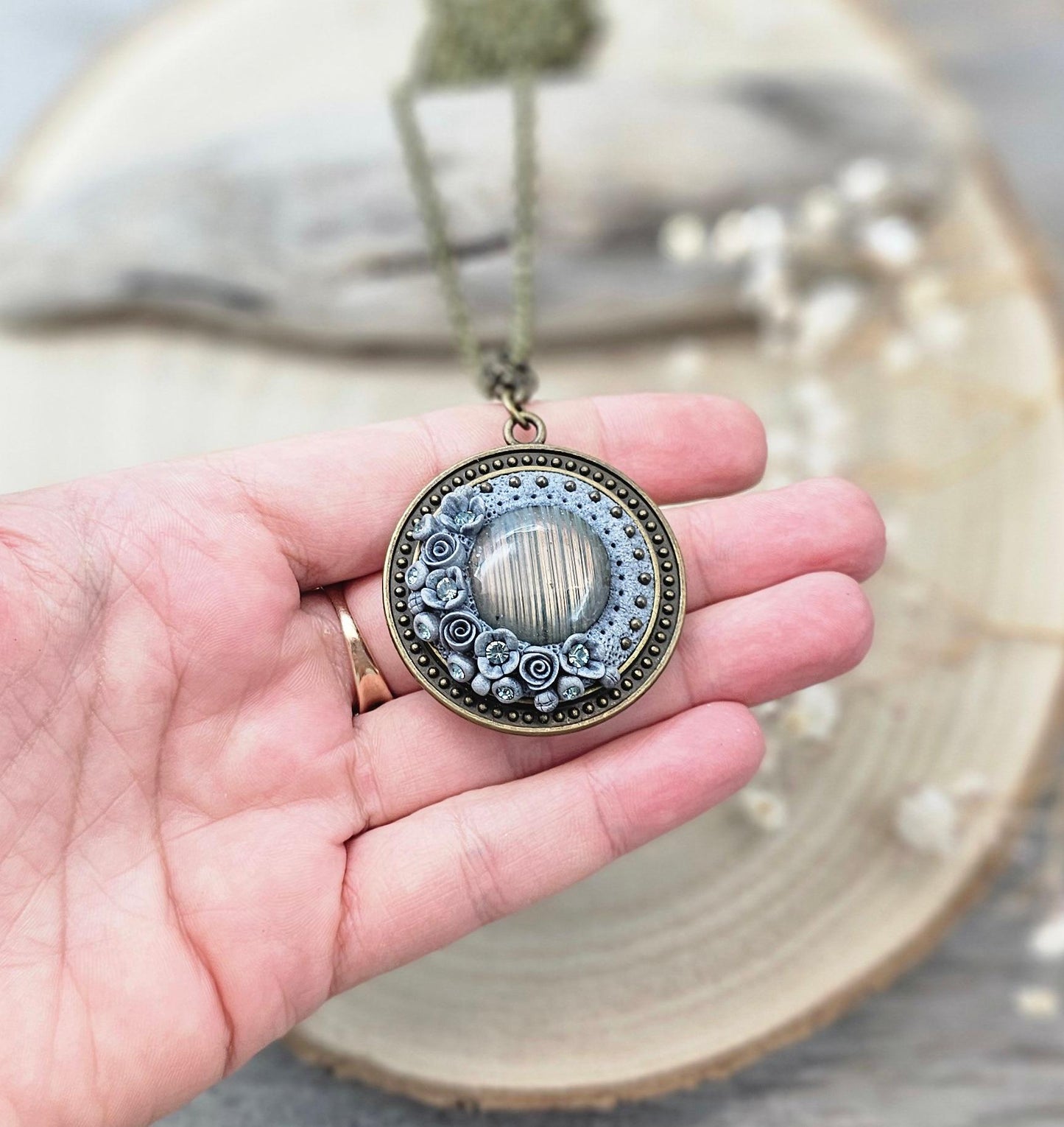 wonderful talisman, amulet. Handmade pendant with labradorite. Jewelry for a photo. Jewelry for essential oil.