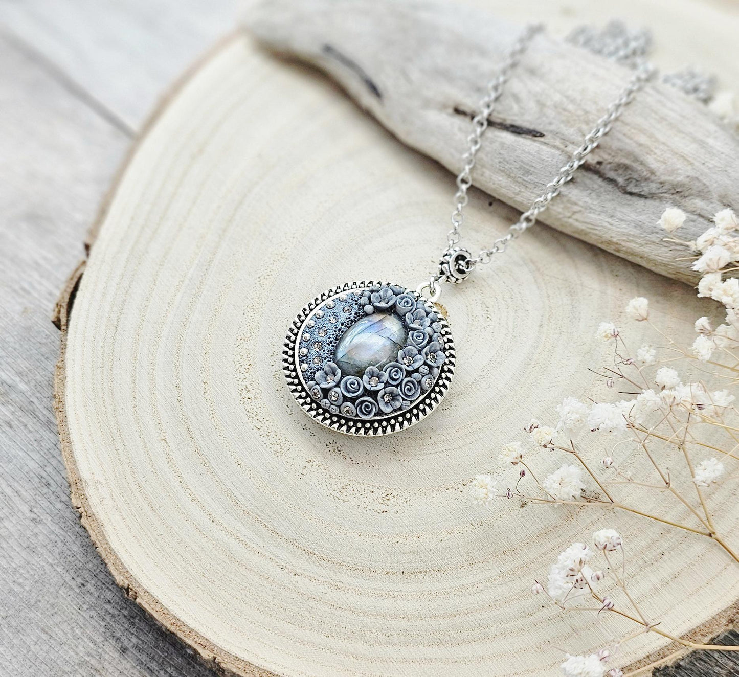 wonderful talisman, amulet. Handmade pendant with labradorite. Jewelry for a photo. Jewelry for essential oil. Blue Labradorite. Dark blue flowers made of polymer clay