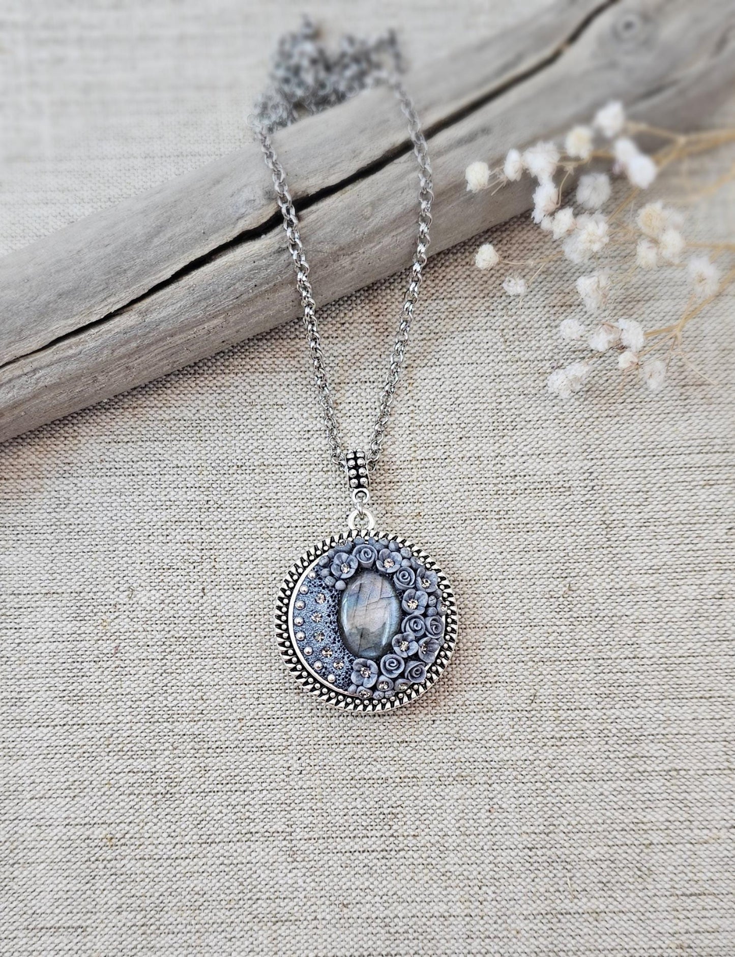 wonderful talisman, amulet. Handmade pendant with labradorite. Jewelry for a photo. Jewelry for essential oil. Blue Labradorite. Dark blue flowers made of polymer clay