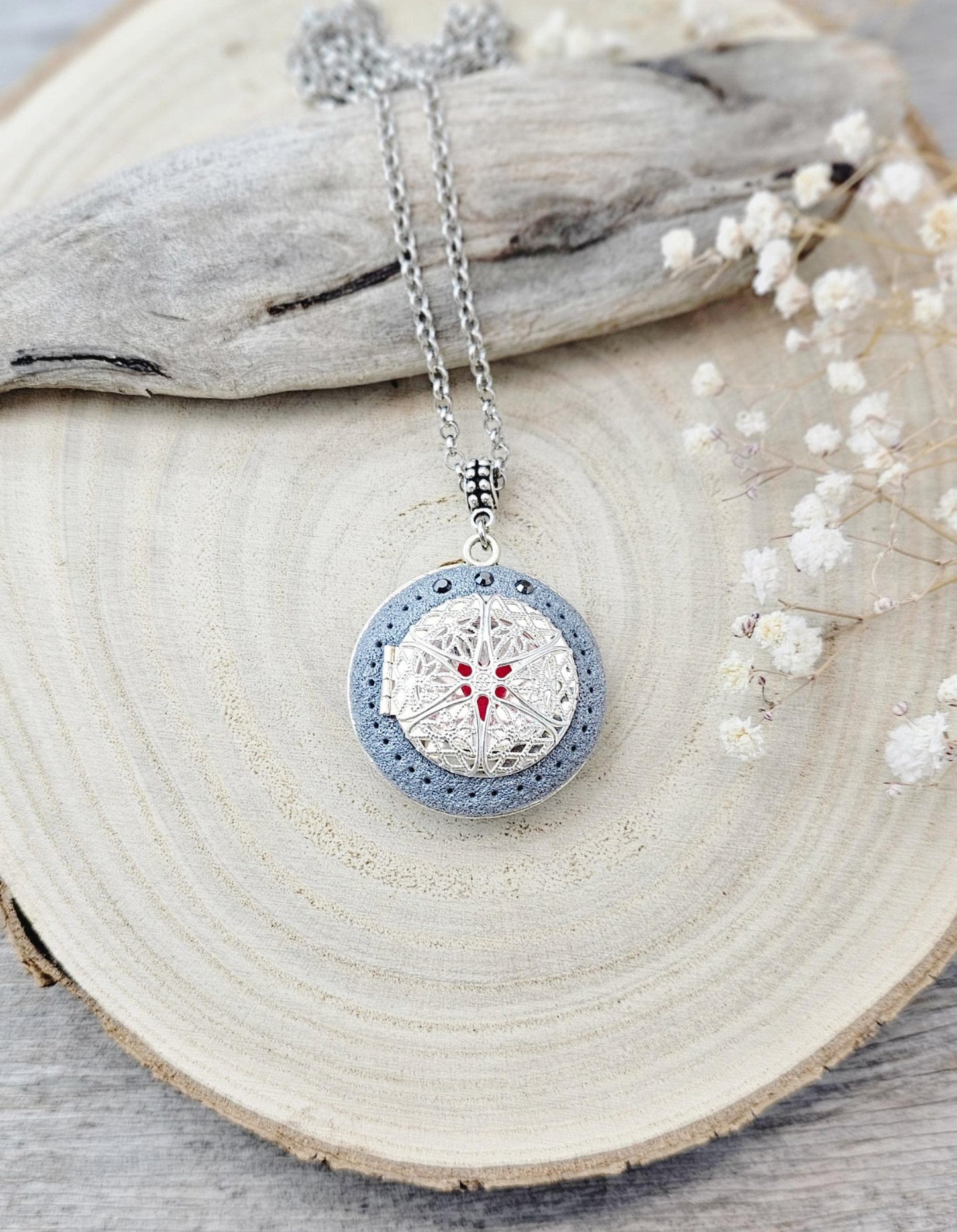 wonderful talisman, amulet. Handmade pendant with labradorite. Jewelry for a photo. Jewelry for essential oil. Blue Labradorite. Dark blue flowers made of polymer clay