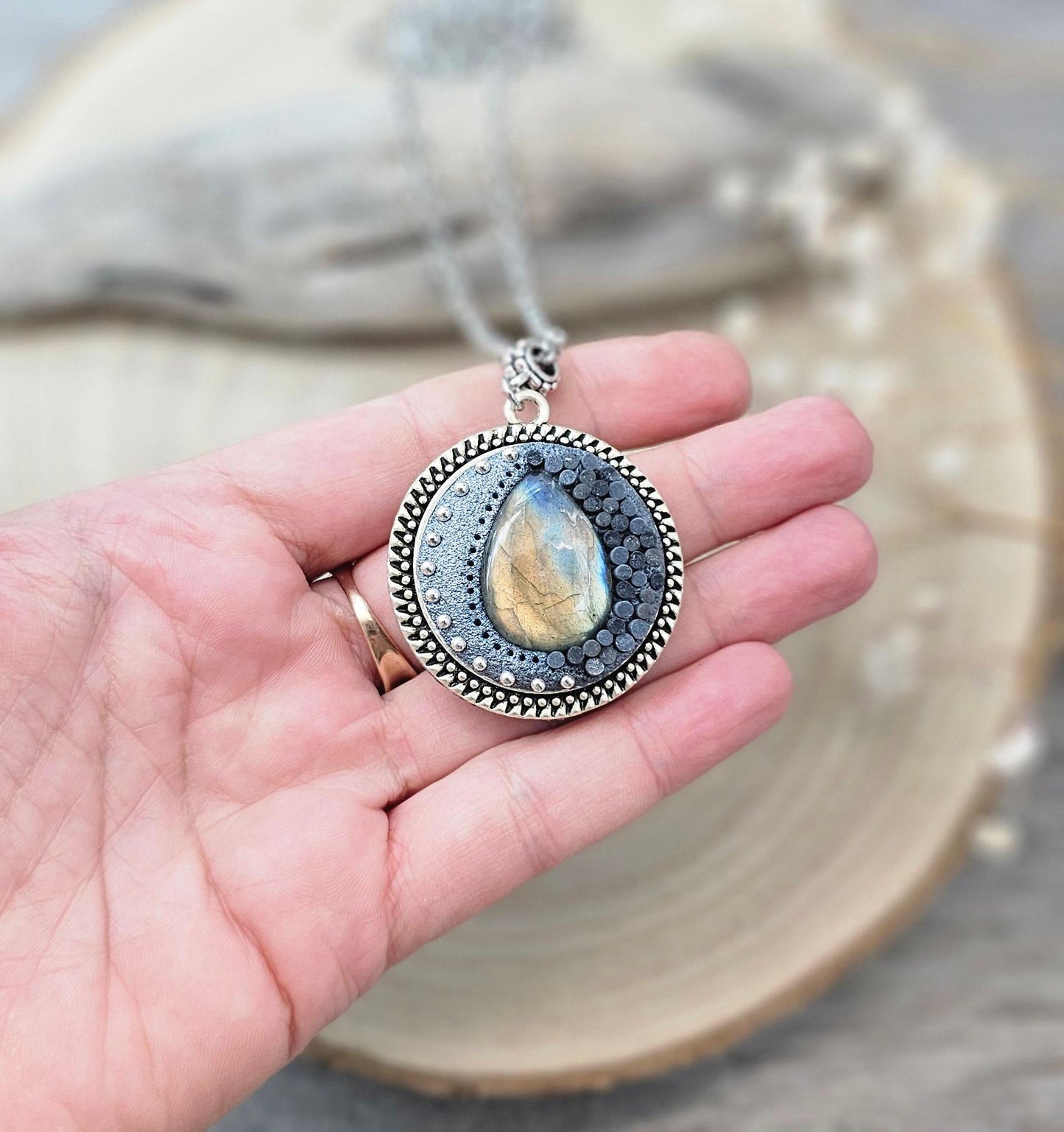 wonderful talisman, amulet. Handmade pendant with labradorite. Jewelry for a photo. Jewelry for essential oil. Blue Labradorite. Dark blue flowers made of polymer clay