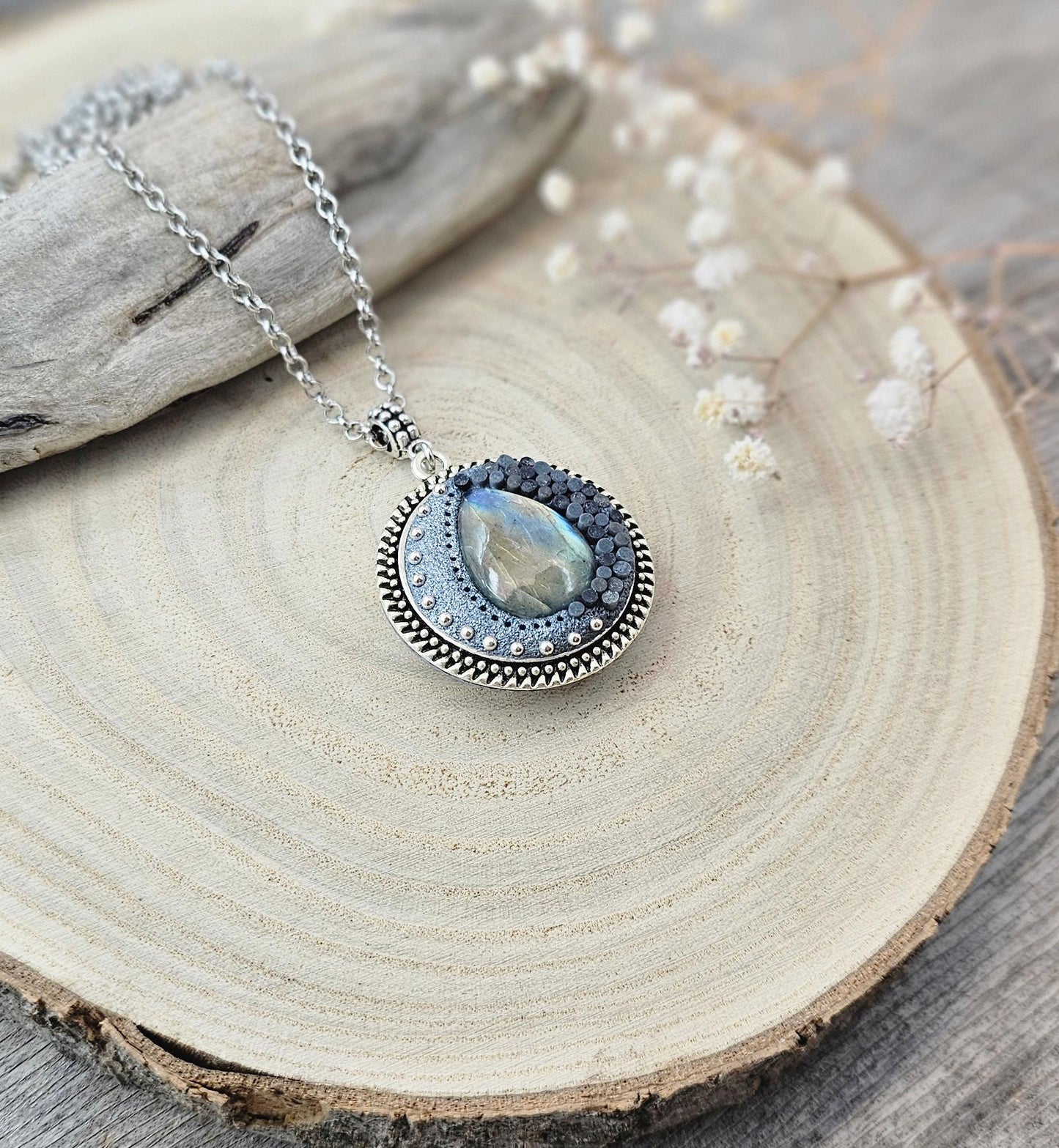 wonderful talisman, amulet. Handmade pendant with labradorite. Jewelry for a photo. Jewelry for essential oil. Blue Labradorite. Dark blue flowers made of polymer clay