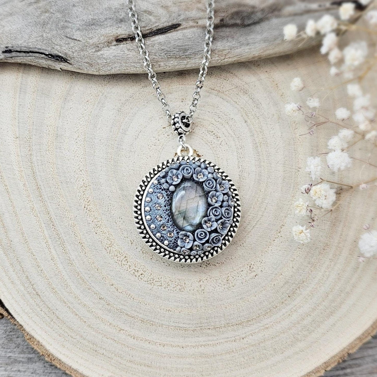 wonderful talisman, amulet. Handmade pendant with labradorite. Jewelry for a photo. Jewelry for essential oil. Blue Labradorite. Dark blue flowers made of polymer clay