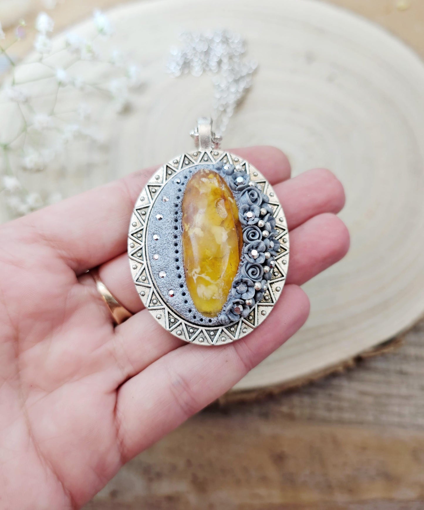 Double-sided Pendant locket with baltic amber and polymer clay flowers