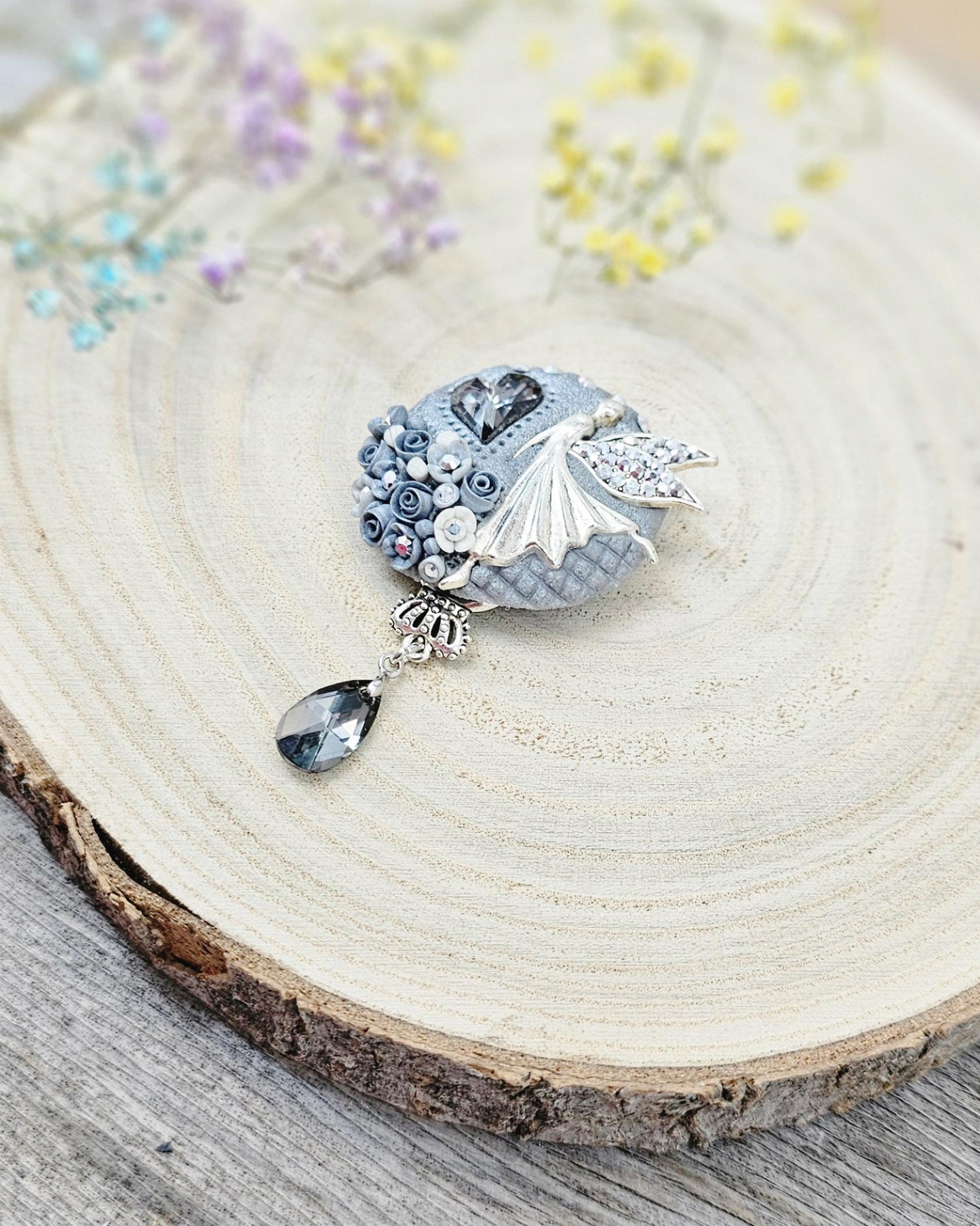 handmade polymer clay brooch with flowers, crystals and heart. Flower jewelry.
