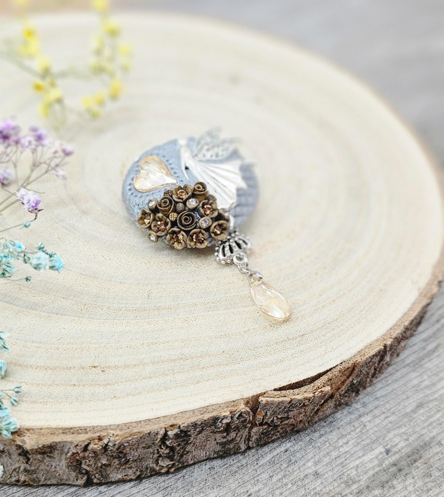 handmade polymer clay brooch with flowers, crystals and heart. Flower jewelry.