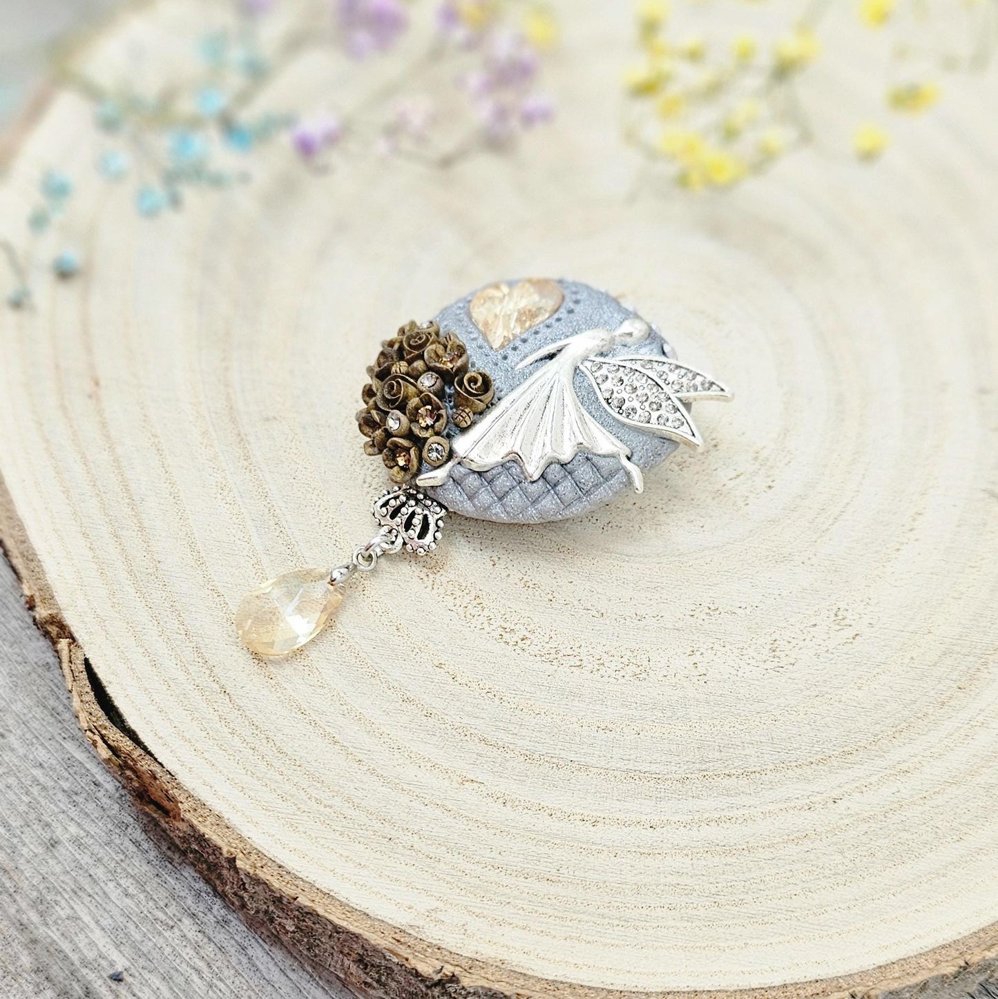 handmade polymer clay brooch with flowers, crystals and heart. Flower jewelry.