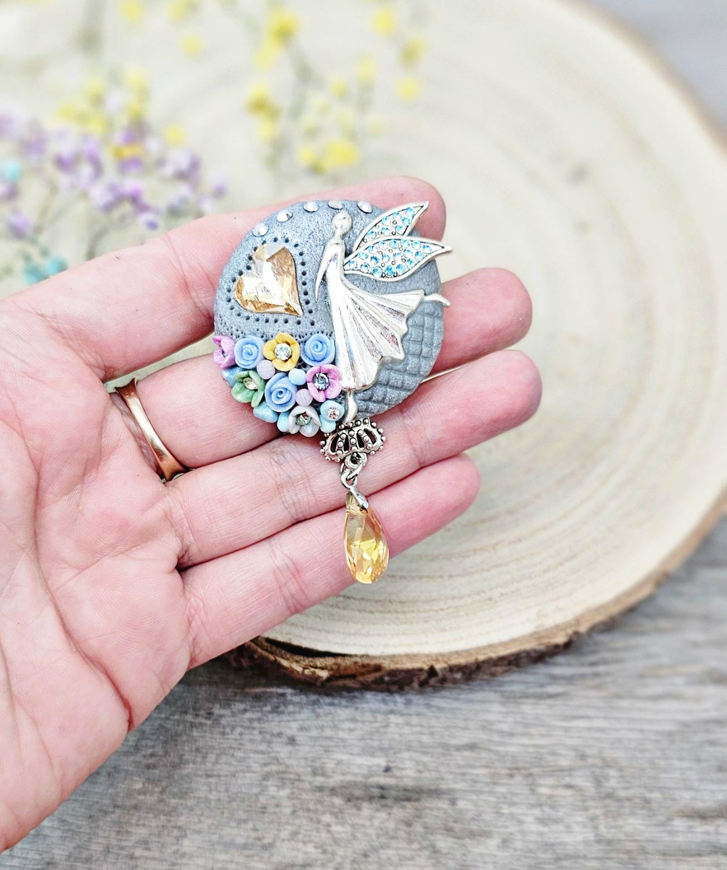 handmade polymer clay brooch with flowers, crystals and heart. Flower jewelry.