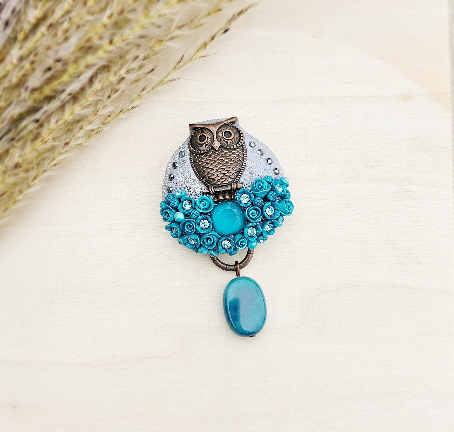Handcrafted brooch from polymer clay with owl