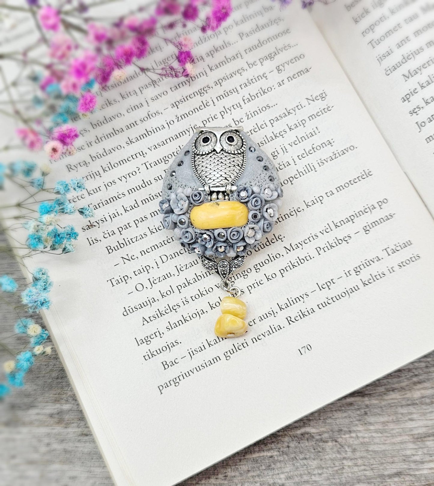 handmade polymer clay brooch with owl and handmade flowers and baltic amber