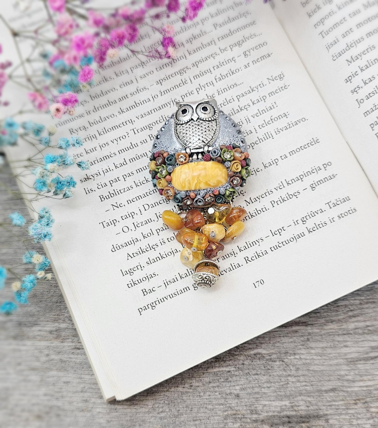 handmade polymer clay brooch with owl and handmade flowers and amber