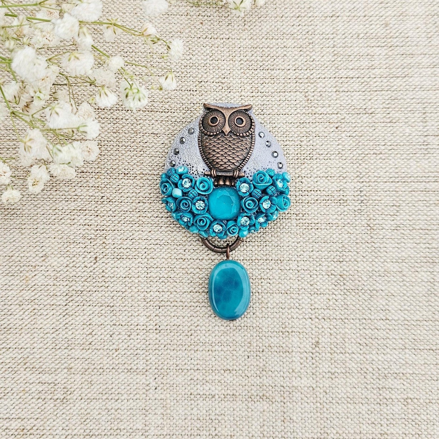Handcrafted brooch from polymer clay with owl
