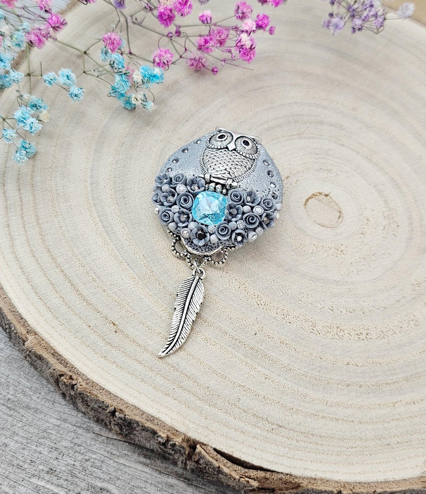 handmade polymer clay brooch with owl and handmade flowers and crystal
