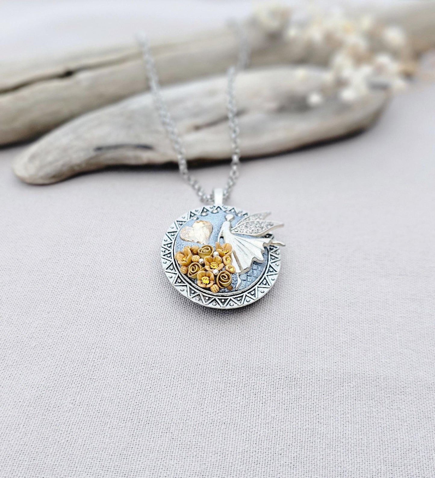 soft gold pendant, fairy locket, floral jewelry, crystal heart necklace, handcrafted pendant, whimsical charm, fairy tale jewelry, unique locket, keepsake necklace, elegant accessory, photo locket, artisan necklace, silver chain pendant