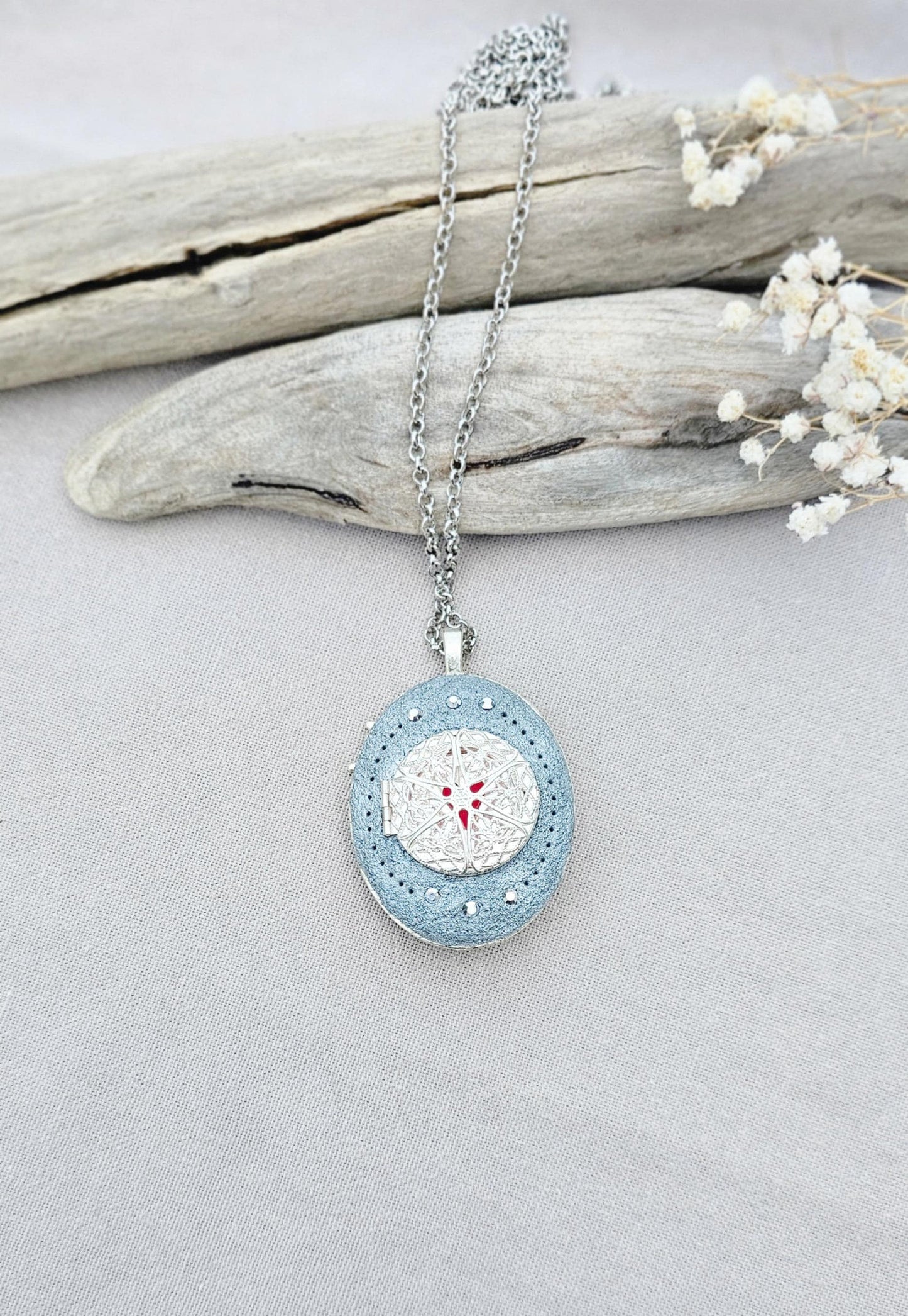 turquoise flower pendant, black crystal charm, fairy locket, silver fairy necklace, unique gift, magical jewelry, photo locket, handcrafted pendant, vibrant floral, elegant accessory, mystical charm, long chain necklace, whimsical locket