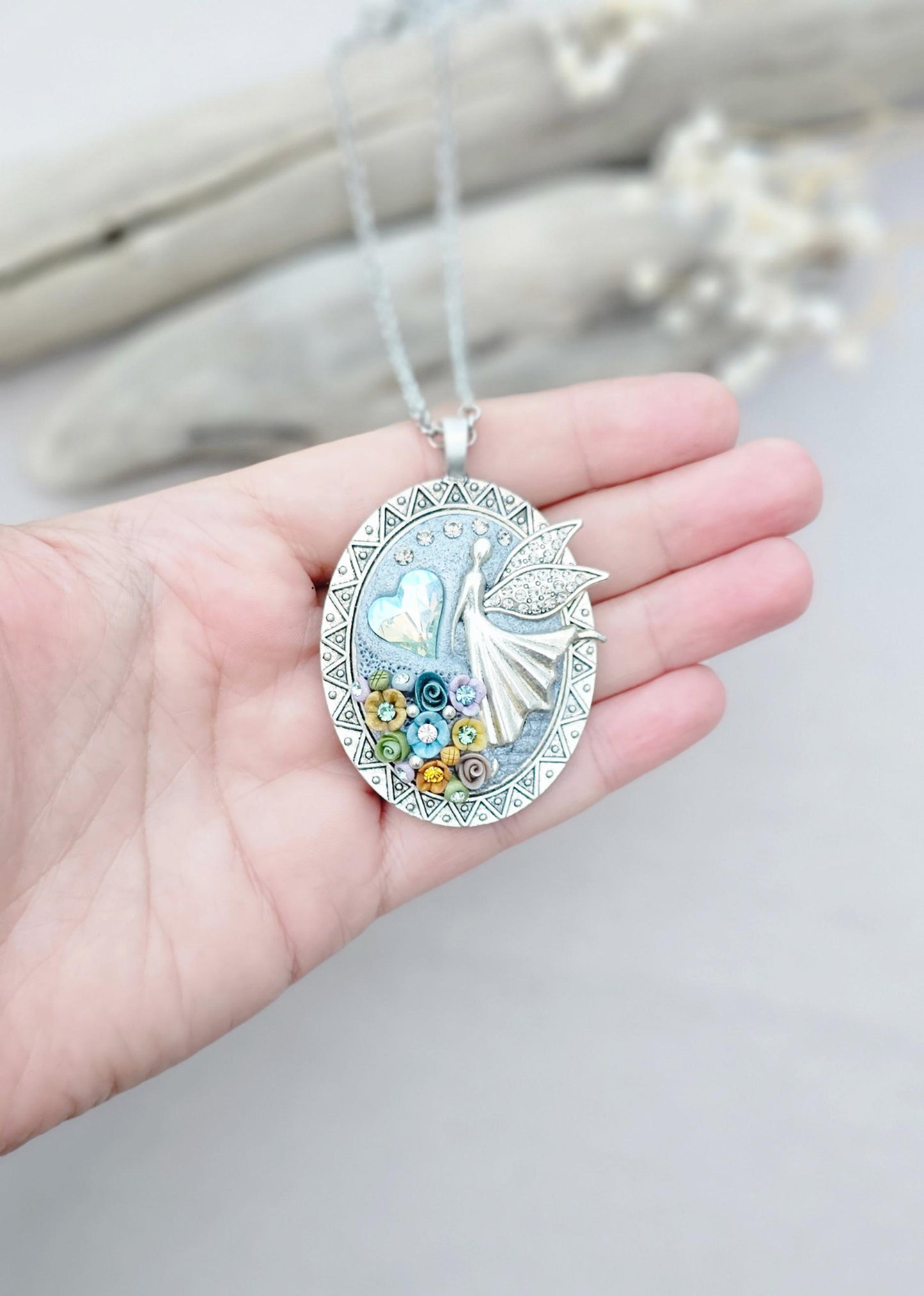 multicolor floral pendant, fairy locket, vibrant jewelry, colorful necklace, keepsake locket, photo pendant, handcrafted fairy, enchanting accessory, unique gift, magical charm, floral fairy necklace, whimsical jewelry, silver chain pendant