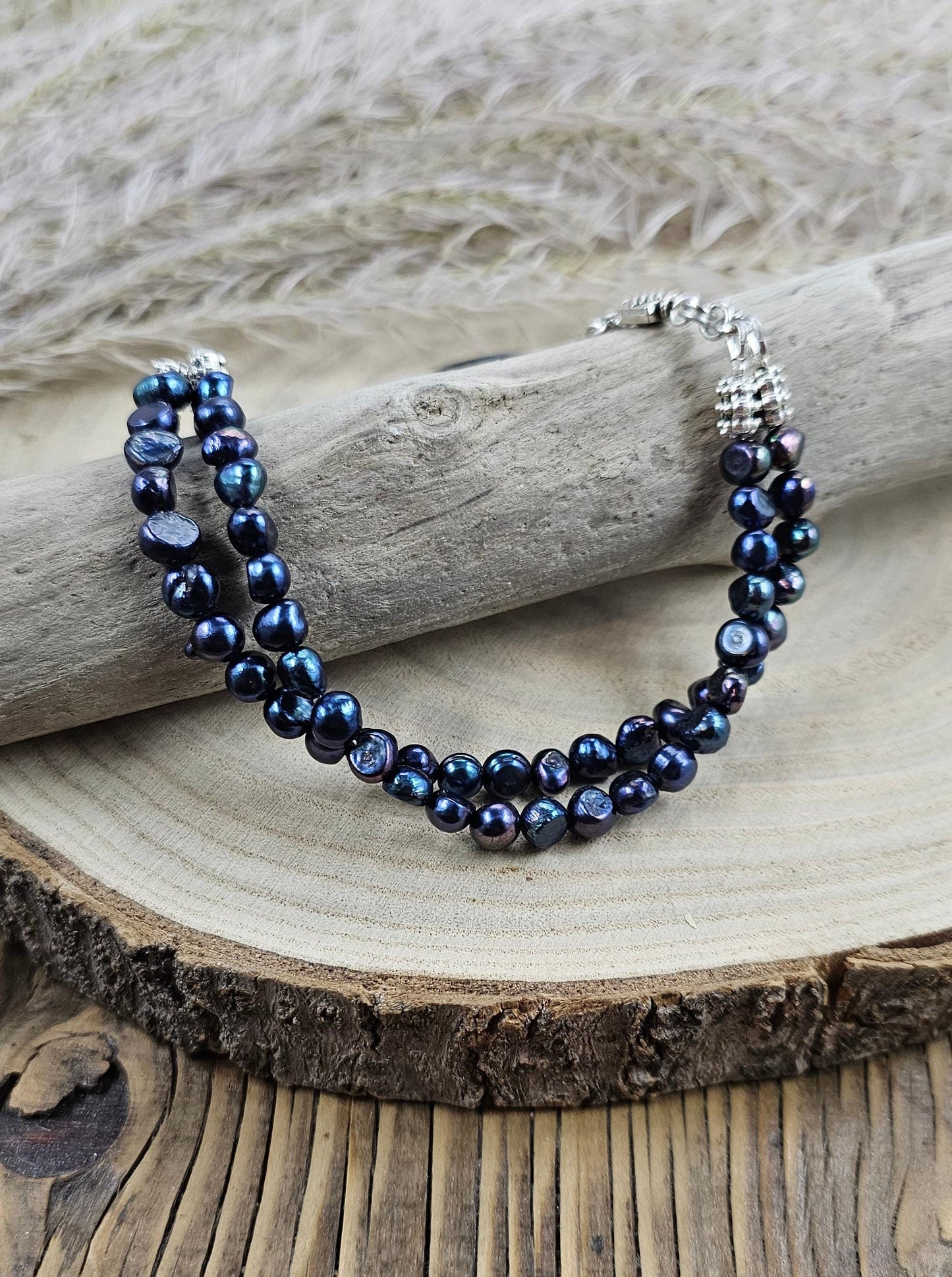 Handcrafted bracelet with labradorite and two rows of dark blue pearl beads