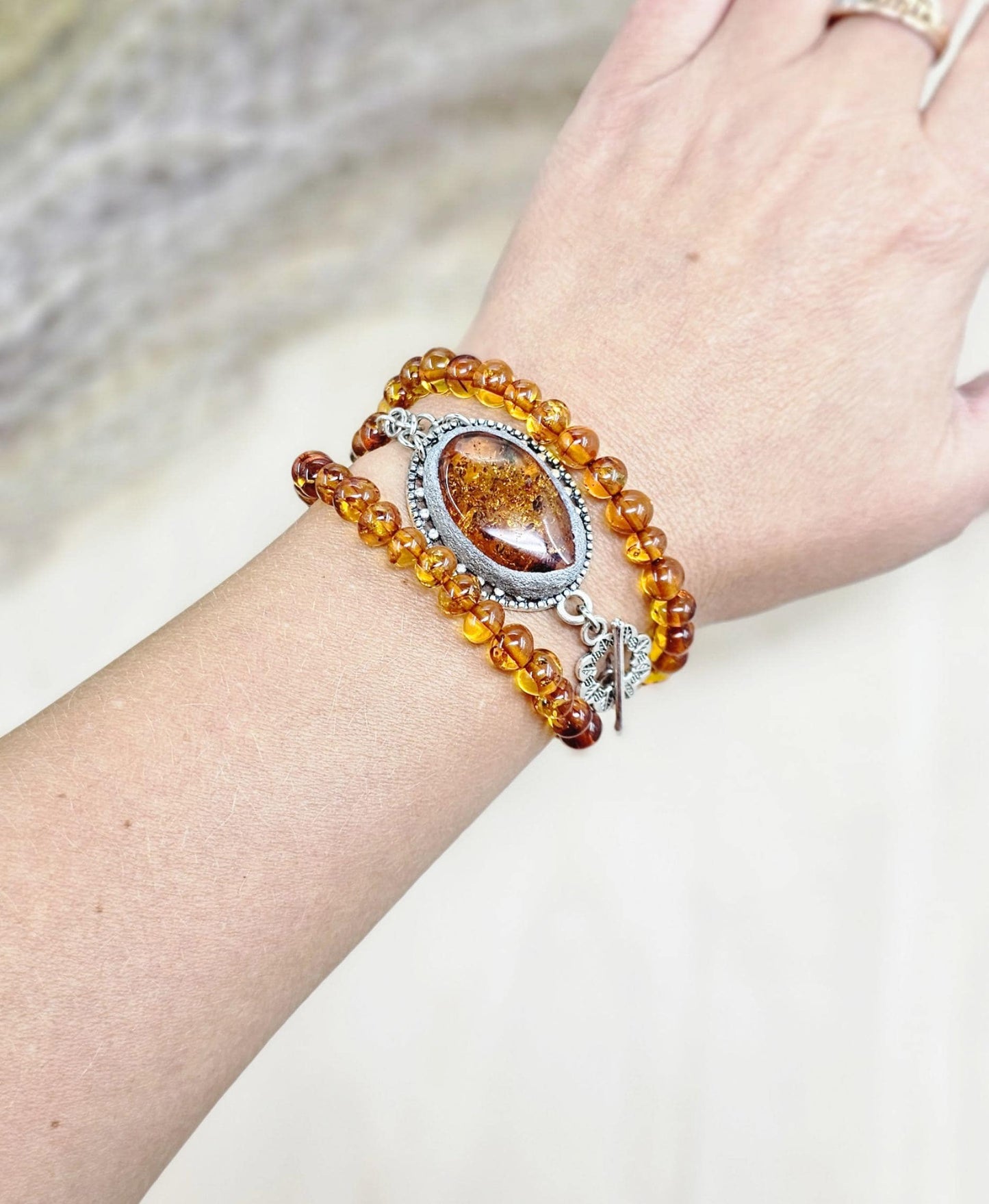 A unique bracelet with light transparent baltic amber