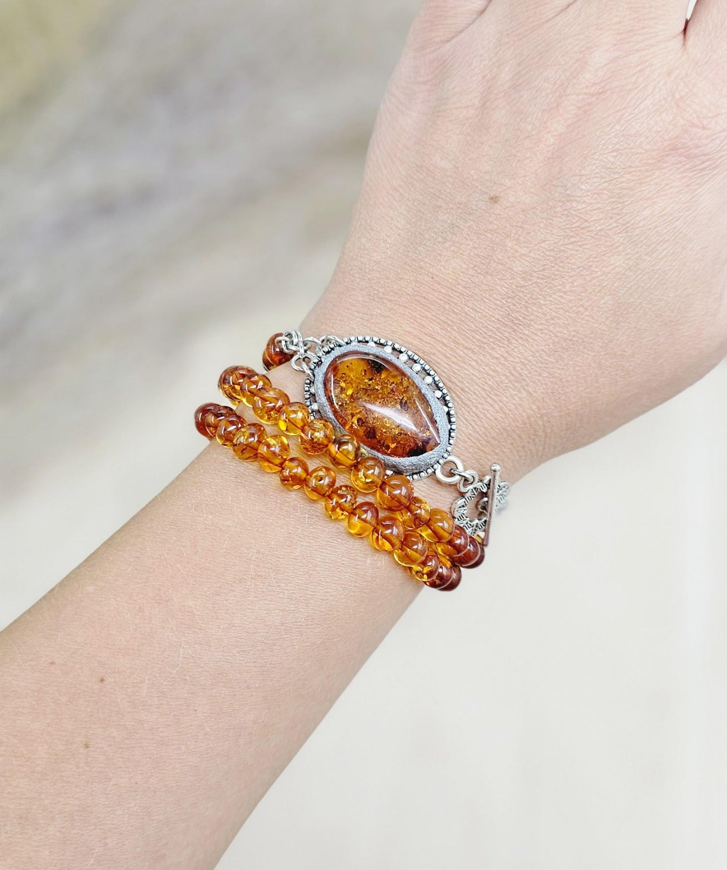 A unique bracelet with light transparent baltic amber