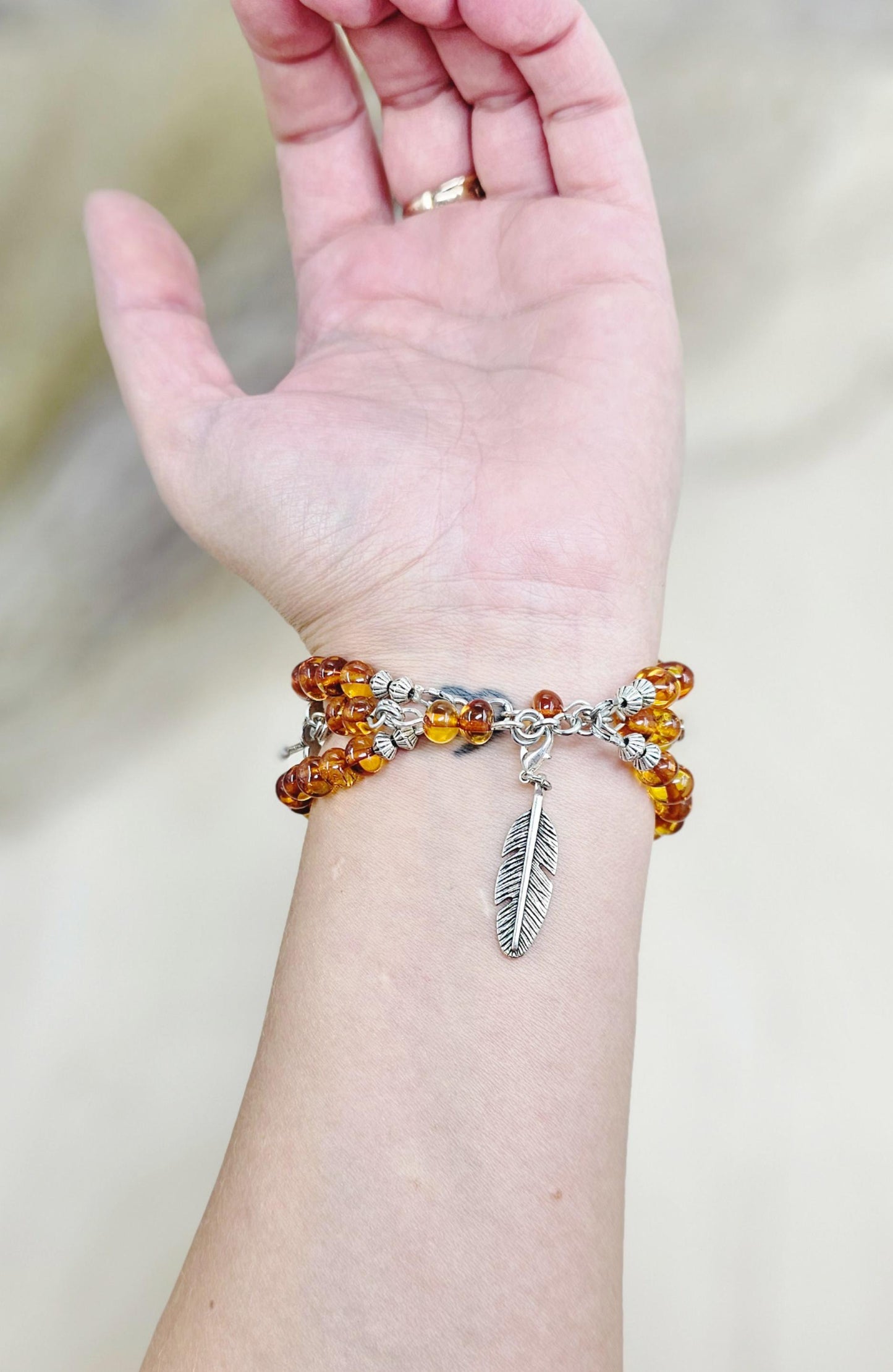 A unique bracelet with light transparent baltic amber