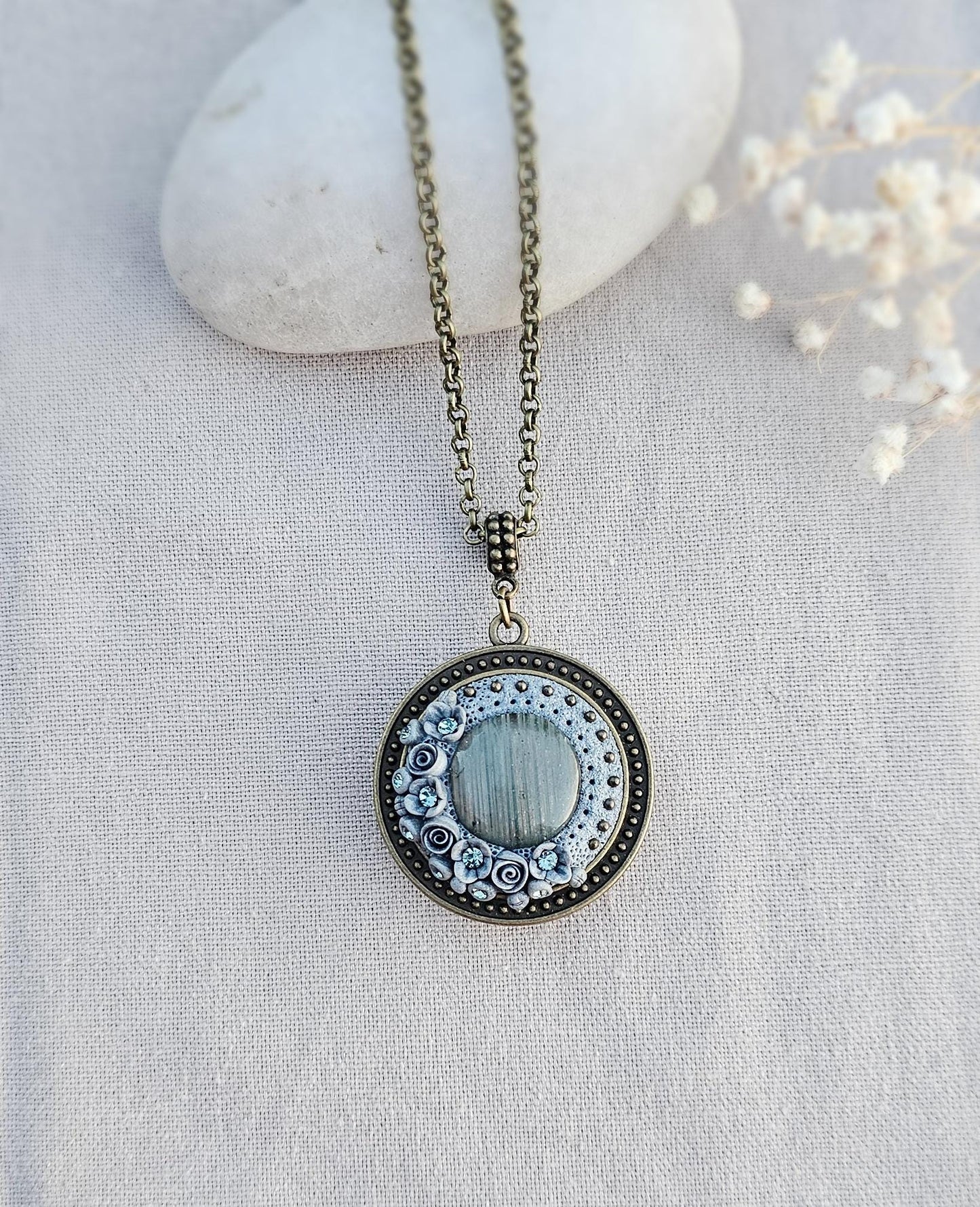 wonderful talisman, amulet. Handmade pendant with labradorite. Jewelry for a photo. Jewelry for essential oil.