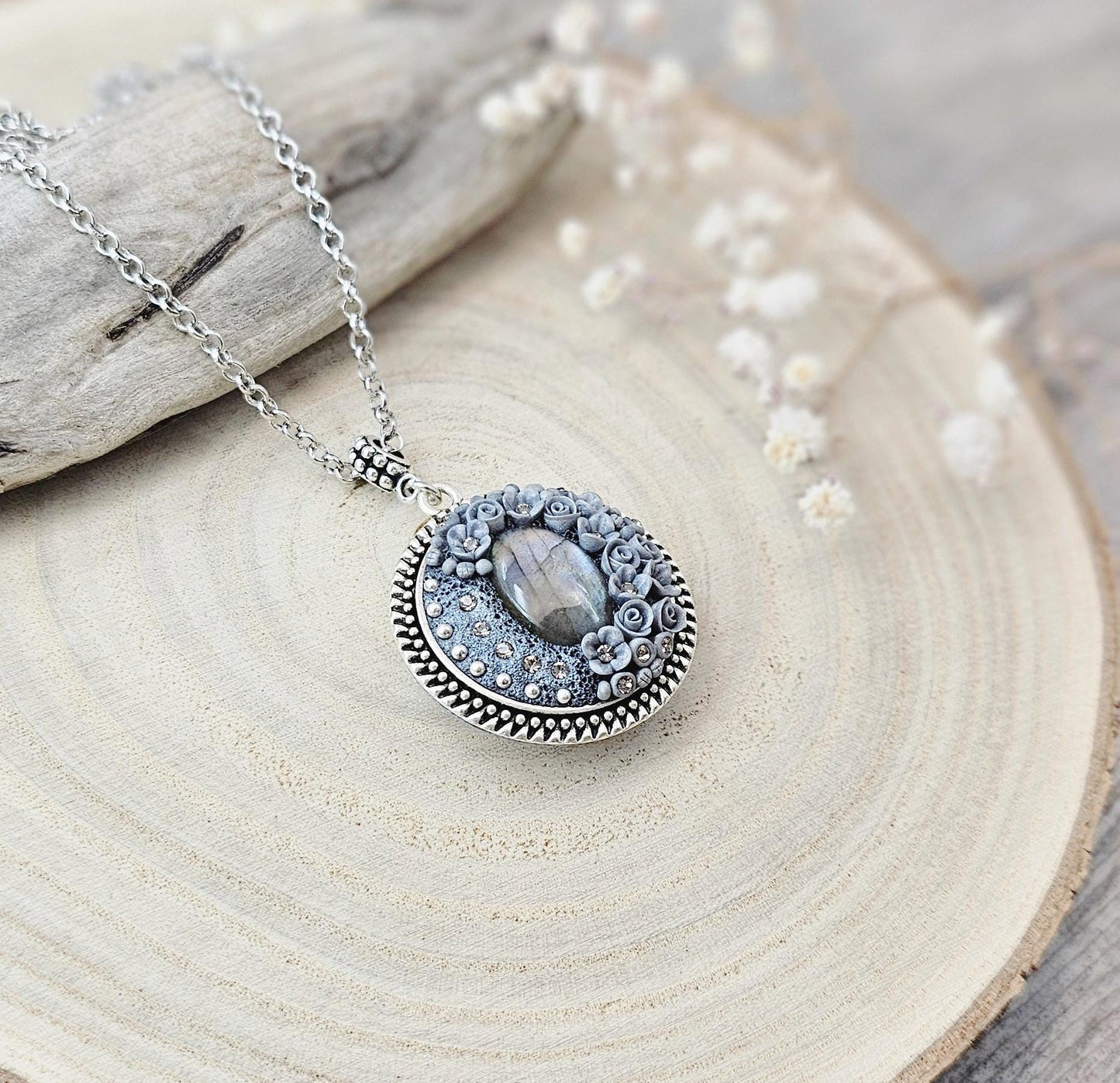 wonderful talisman, amulet. Handmade pendant with labradorite. Jewelry for a photo. Jewelry for essential oil. Blue Labradorite. Dark blue flowers made of polymer clay