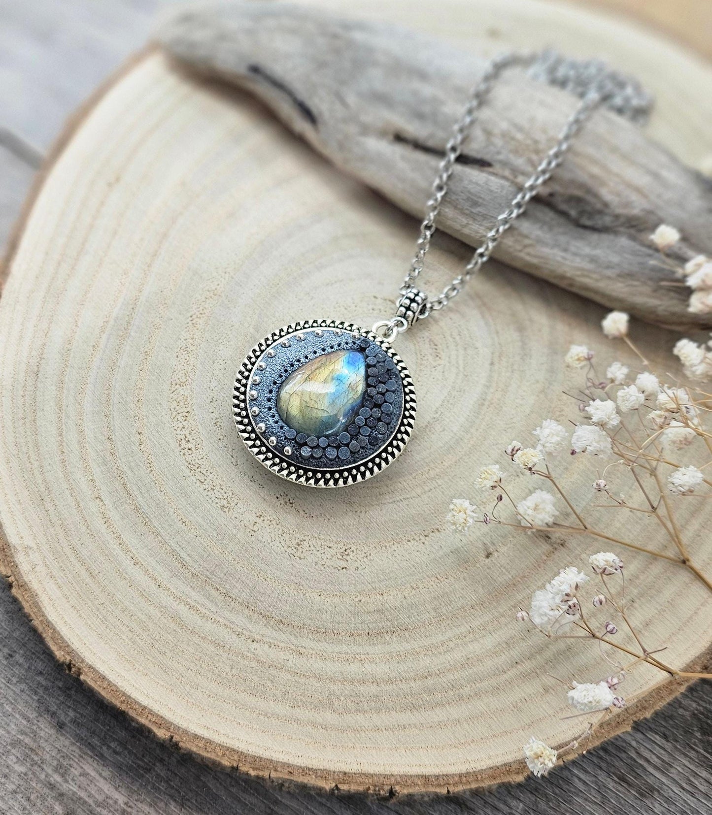 wonderful talisman, amulet. Handmade pendant with labradorite. Jewelry for a photo. Jewelry for essential oil. Blue Labradorite. Dark blue flowers made of polymer clay