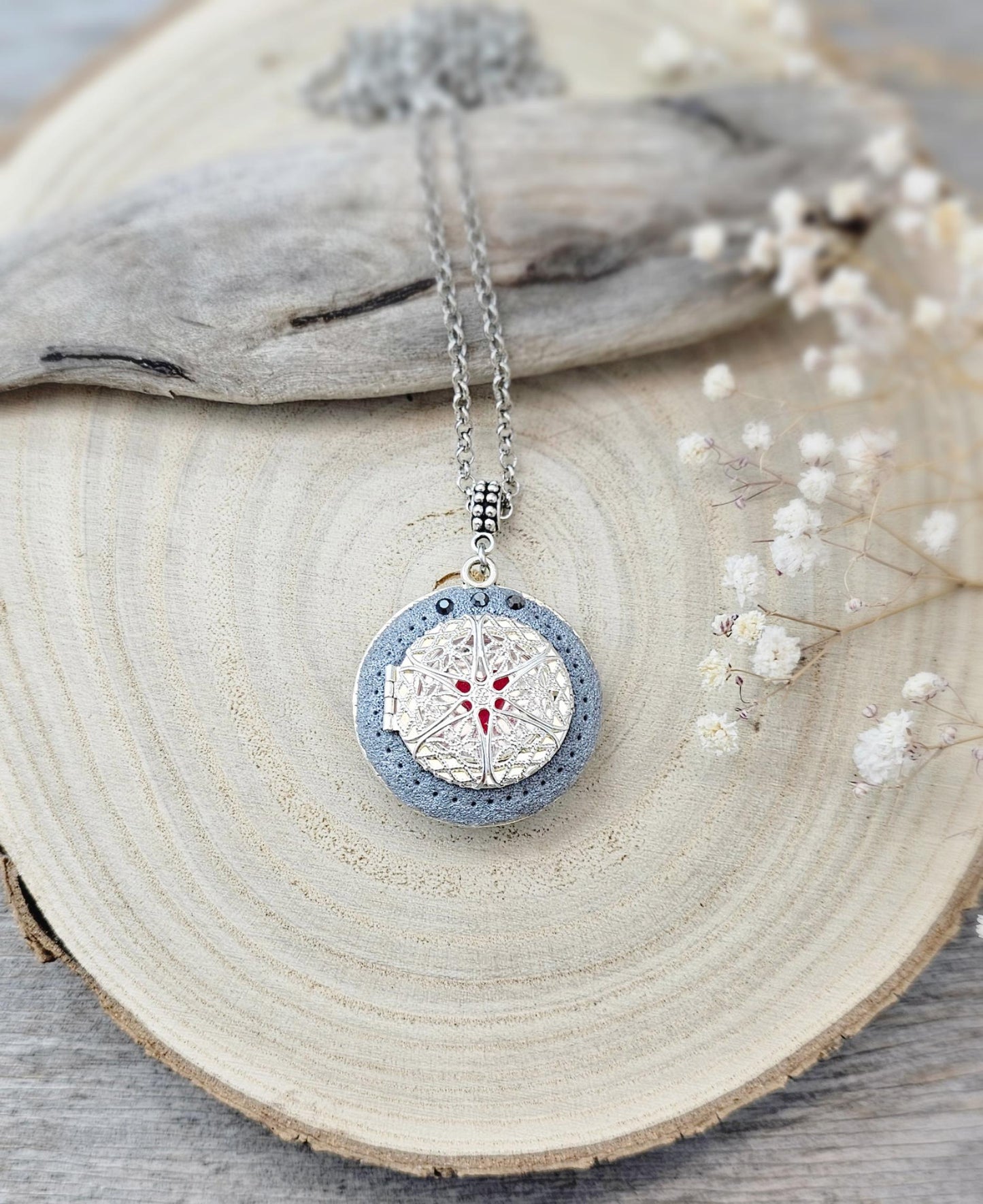 wonderful talisman, amulet. Handmade pendant with labradorite. Jewelry for a photo. Jewelry for essential oil. Blue Labradorite. Dark blue flowers made of polymer clay
