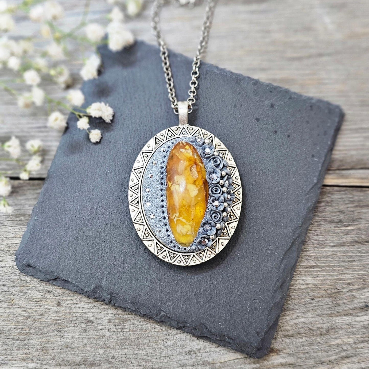 Double-sided Pendant locket with baltic amber and polymer clay flowers