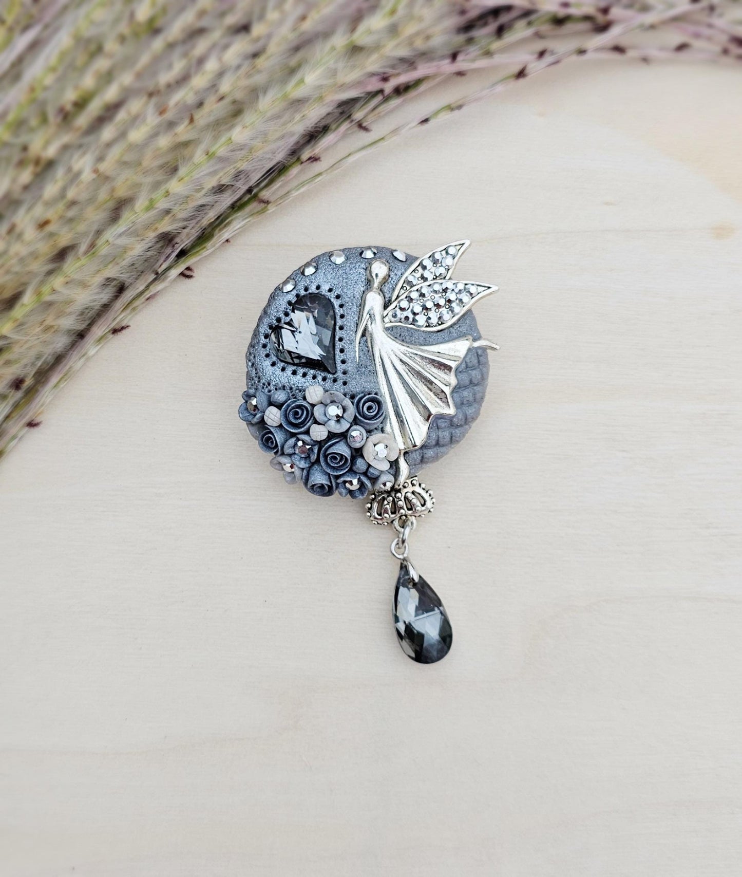 handmade polymer clay brooch with flowers, crystals and heart. Flower jewelry.