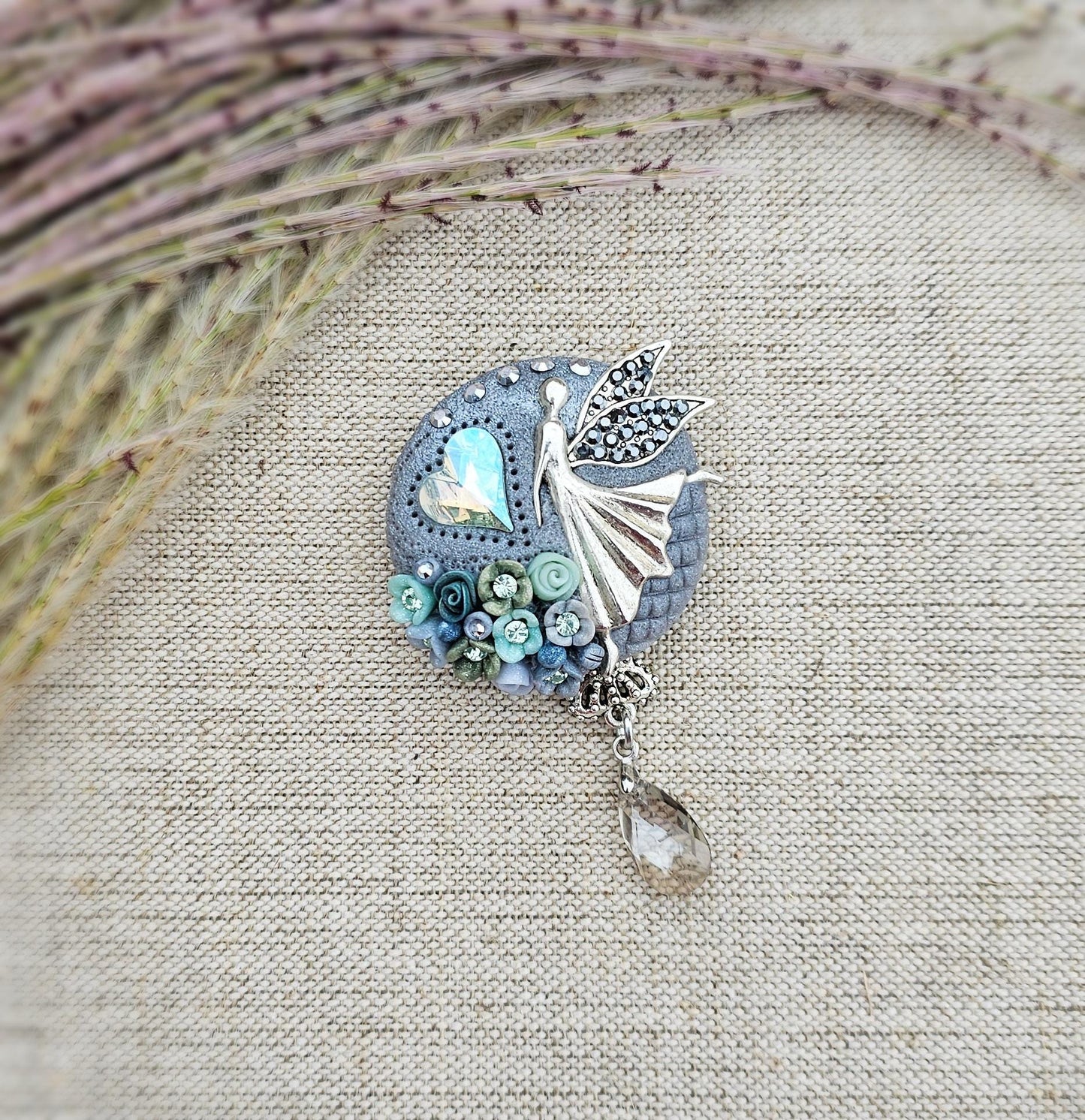 handmade polymer clay brooch with flowers, crystals and heart. Flower jewelry.
