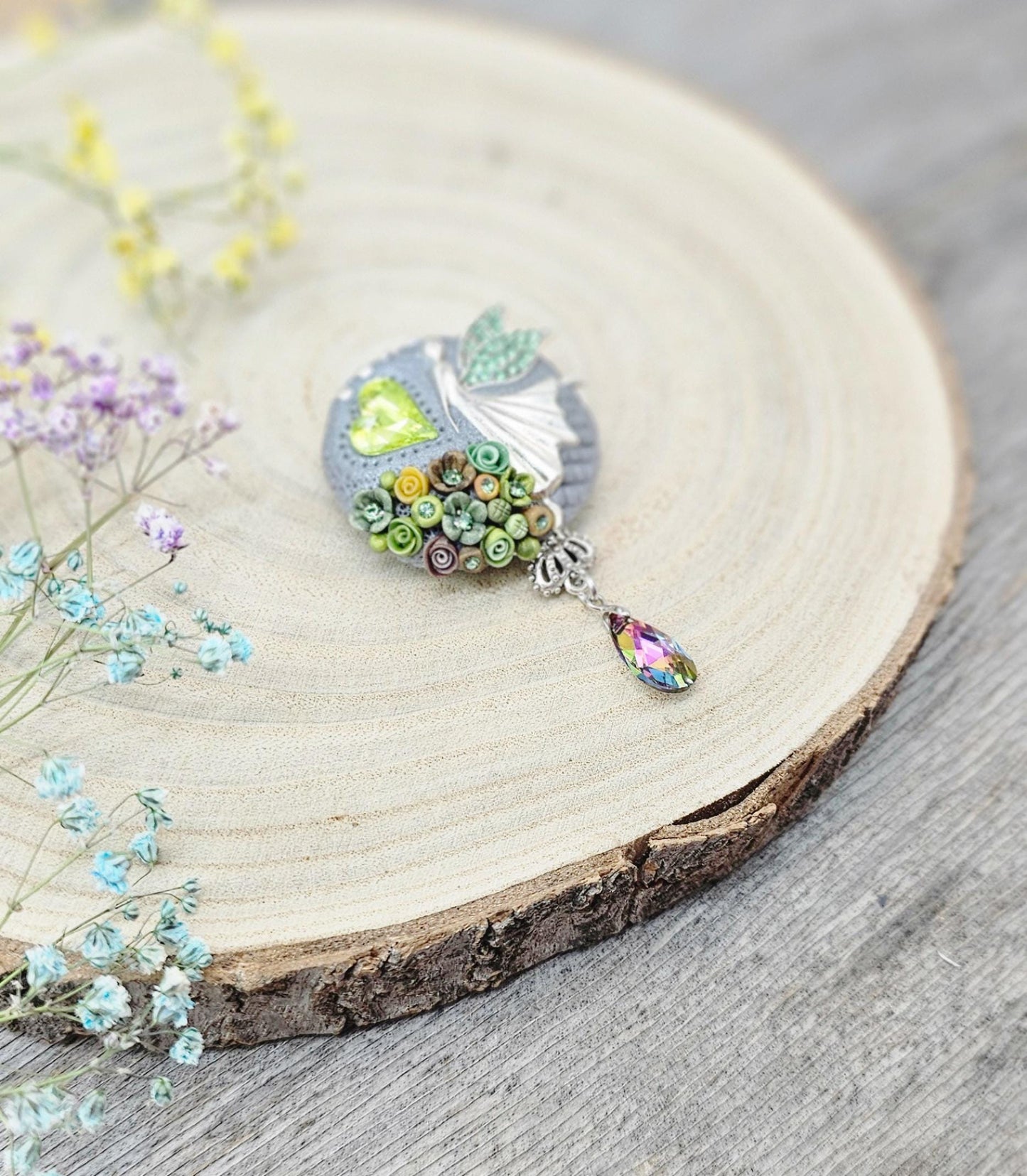 handmade polymer clay brooch with flowers, crystals and heart. Flower jewelry.