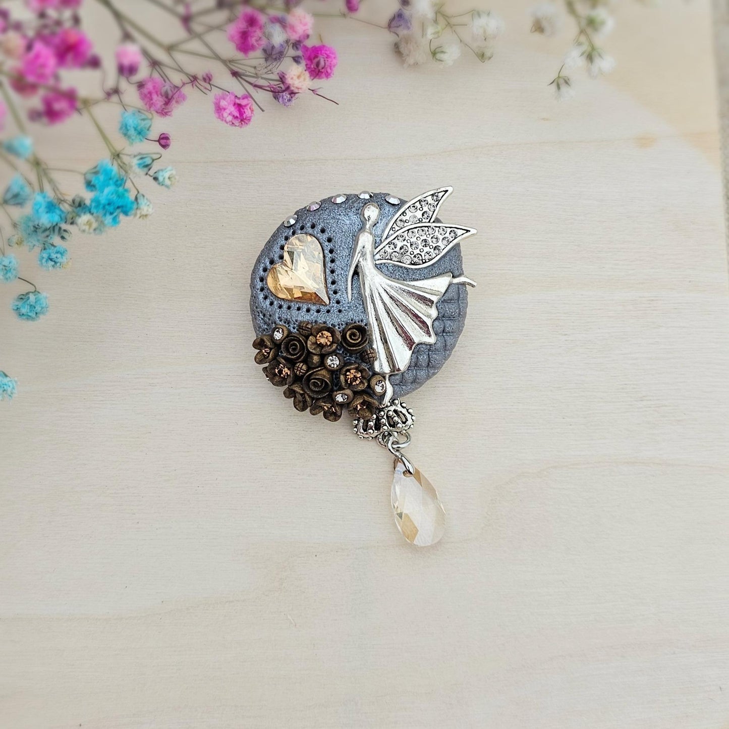 handmade polymer clay brooch with flowers, crystals and heart. Flower jewelry.