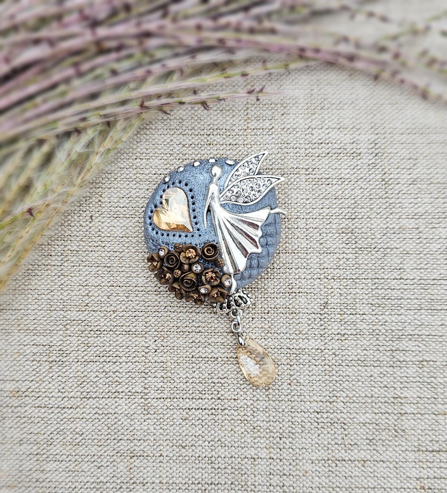 handmade polymer clay brooch with flowers, crystals and heart. Flower jewelry.