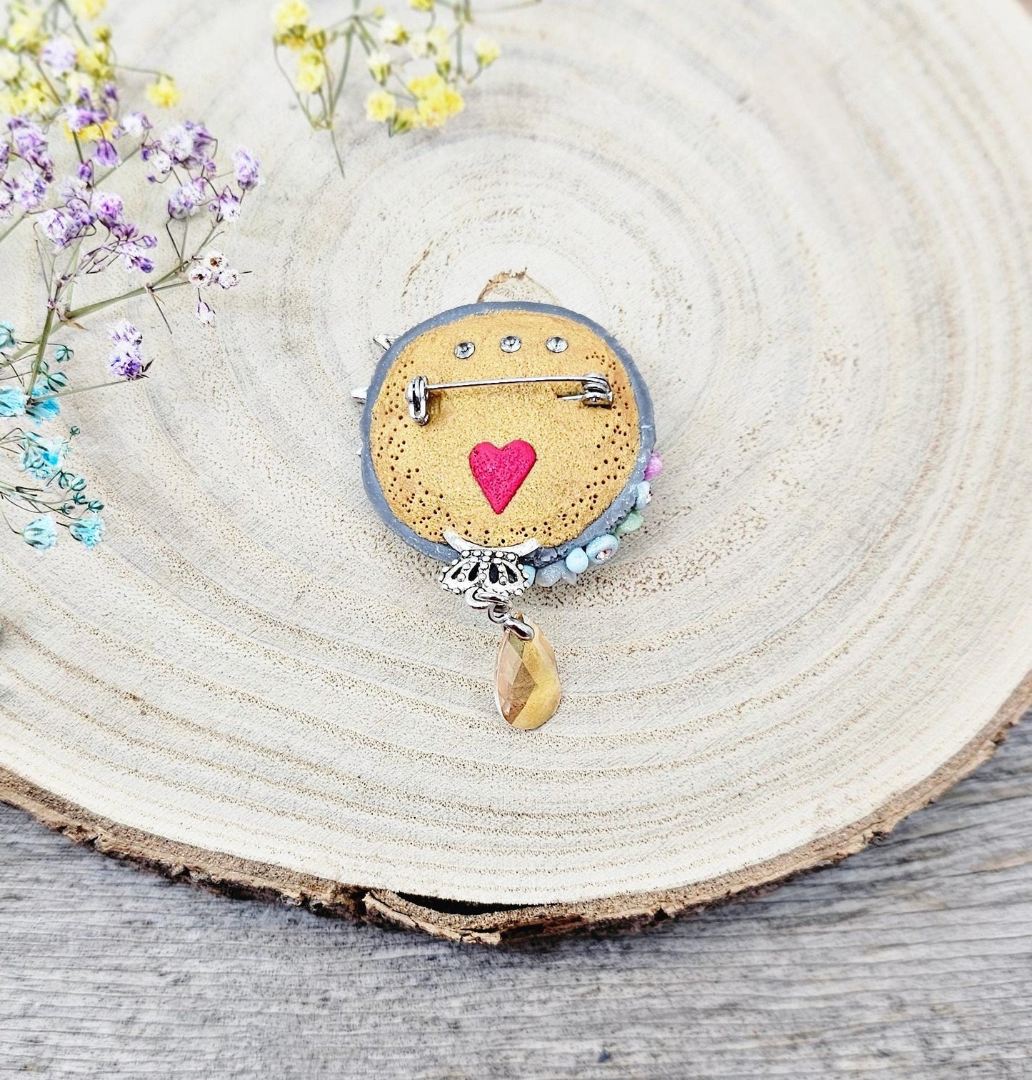 handmade polymer clay brooch with flowers, crystals and heart. Flower jewelry.