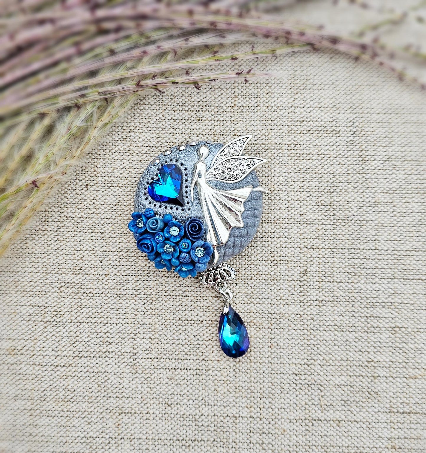 handmade polymer clay brooch with flowers, crystals and heart. Flower jewelry.