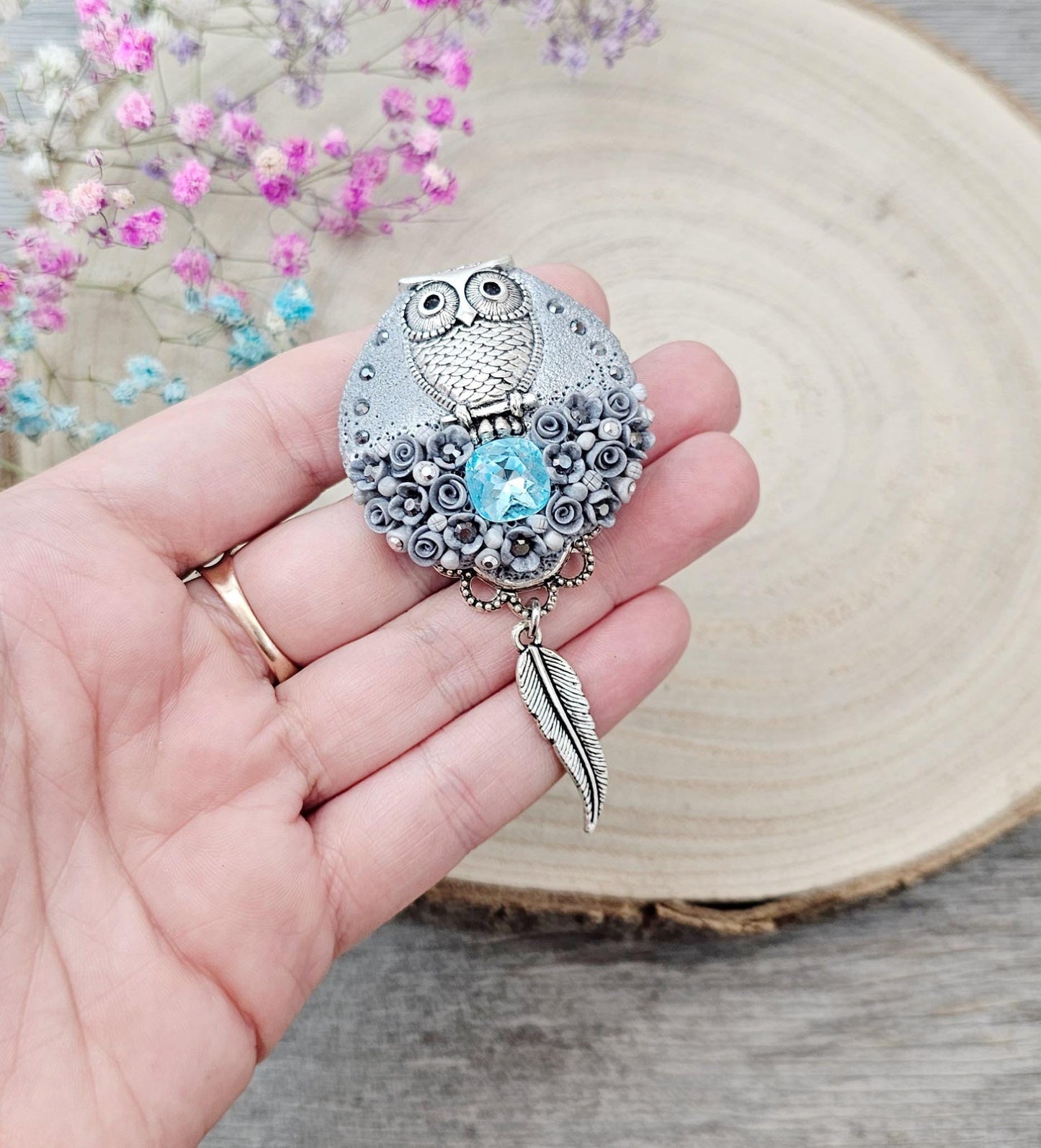 handmade polymer clay brooch with owl and handmade flowers and crystal