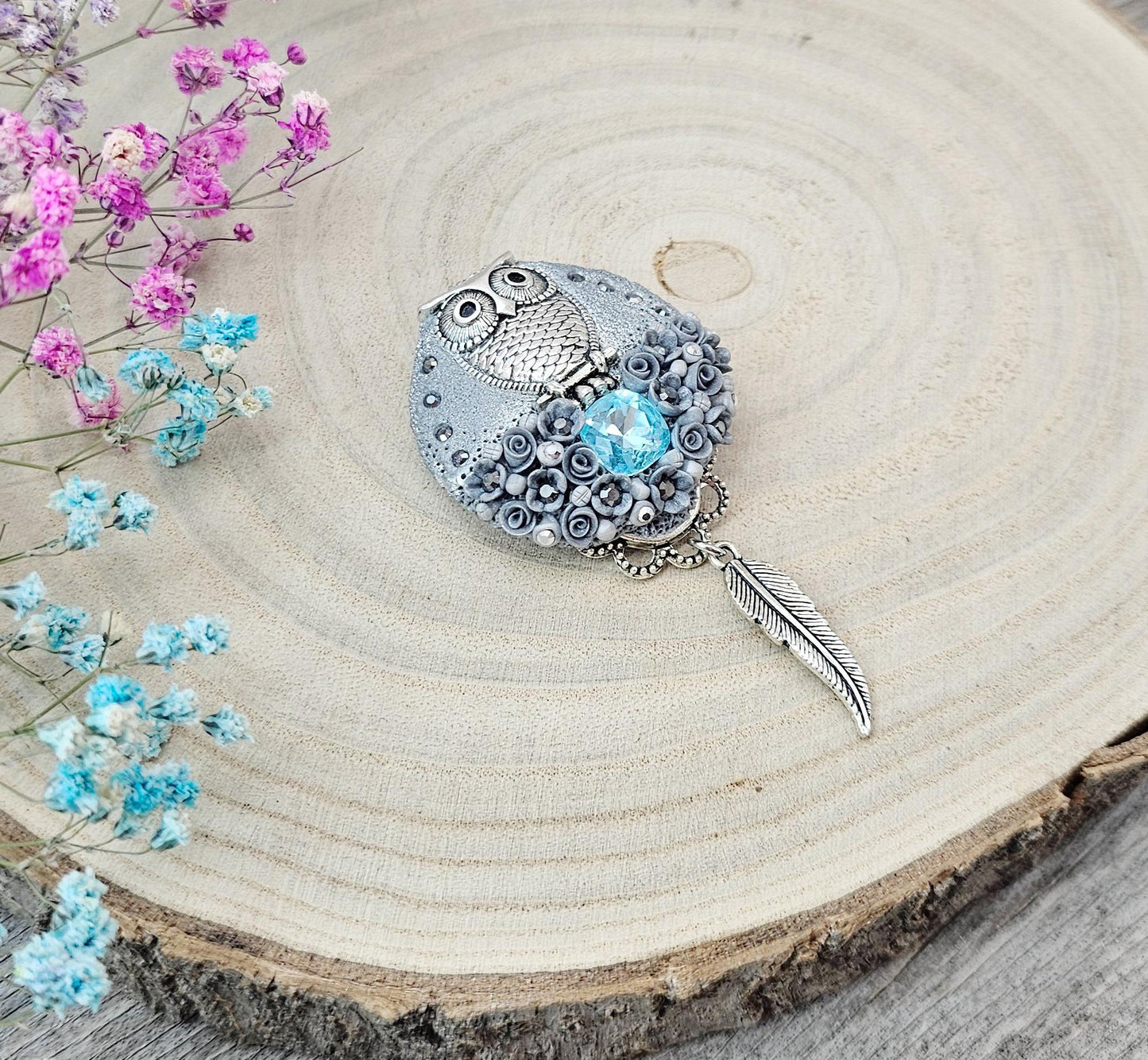 handmade polymer clay brooch with owl and handmade flowers and crystal