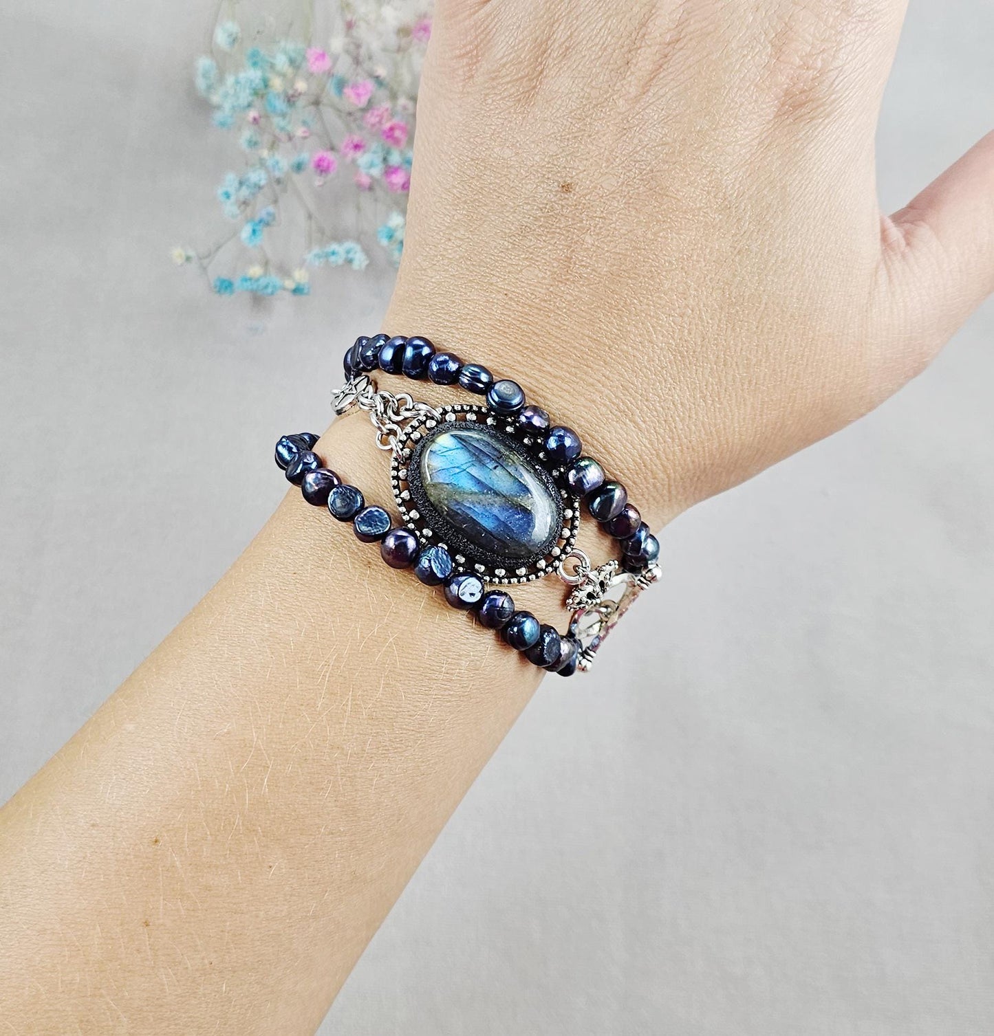 Handcrafted bracelet with labradorite and two rows of dark blue pearl beads