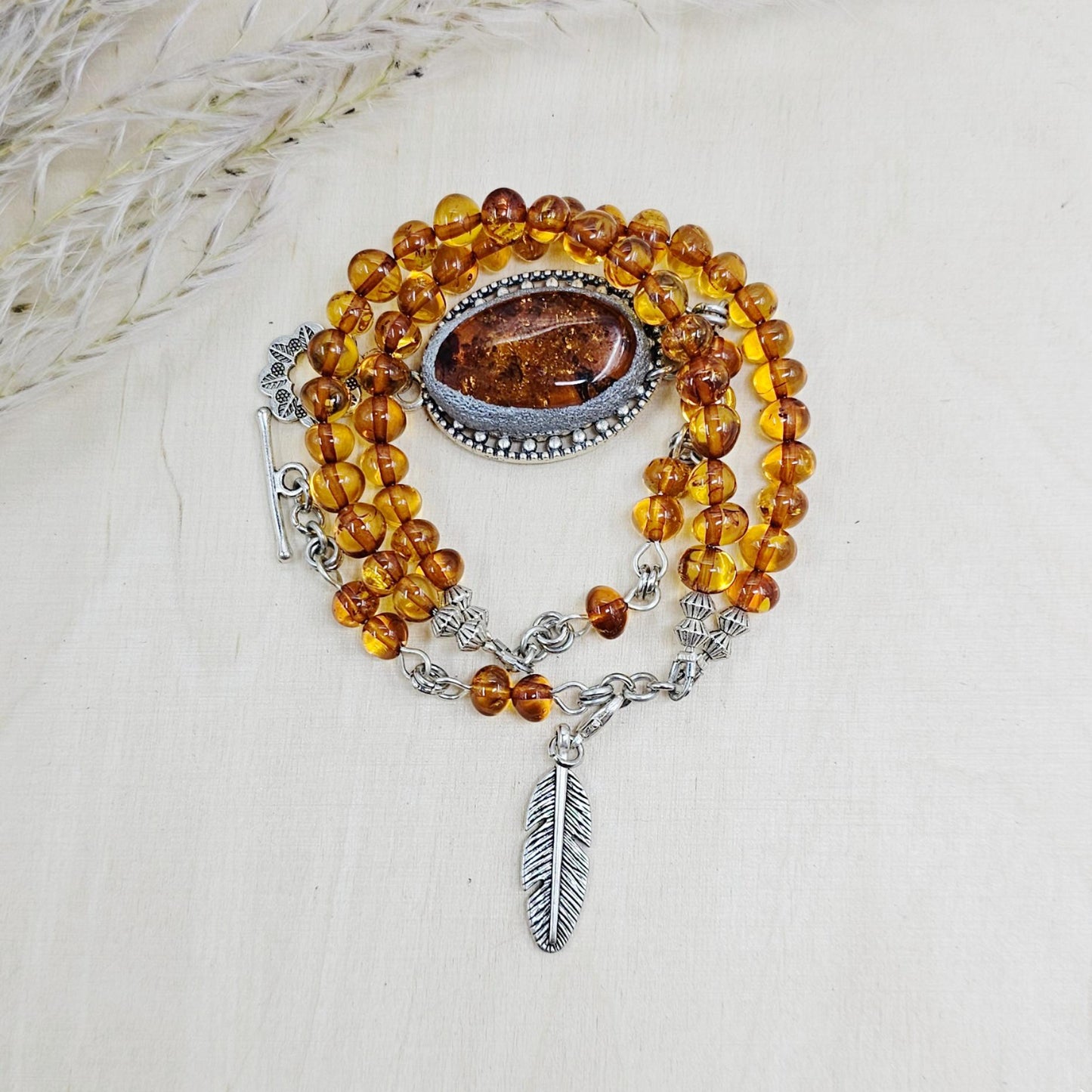A unique bracelet with light transparent baltic amber