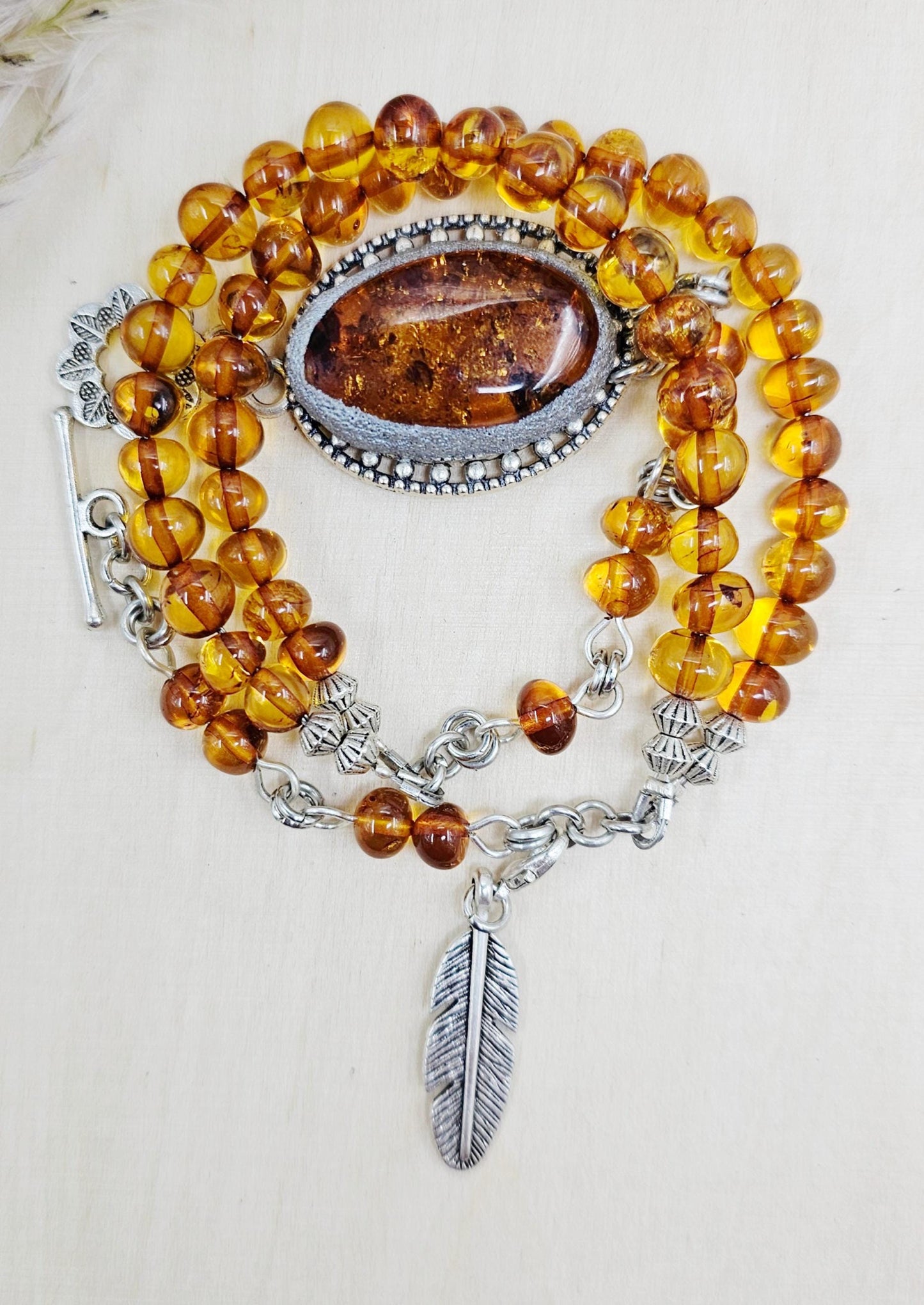 A unique bracelet with light transparent baltic amber