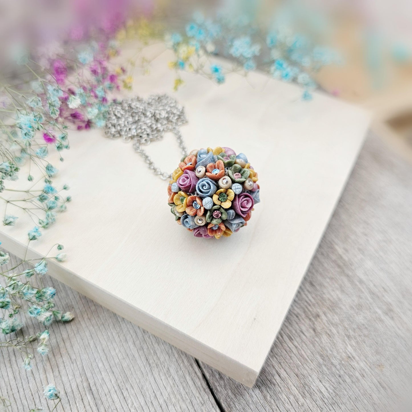 colored pendant made of polymer clay ball