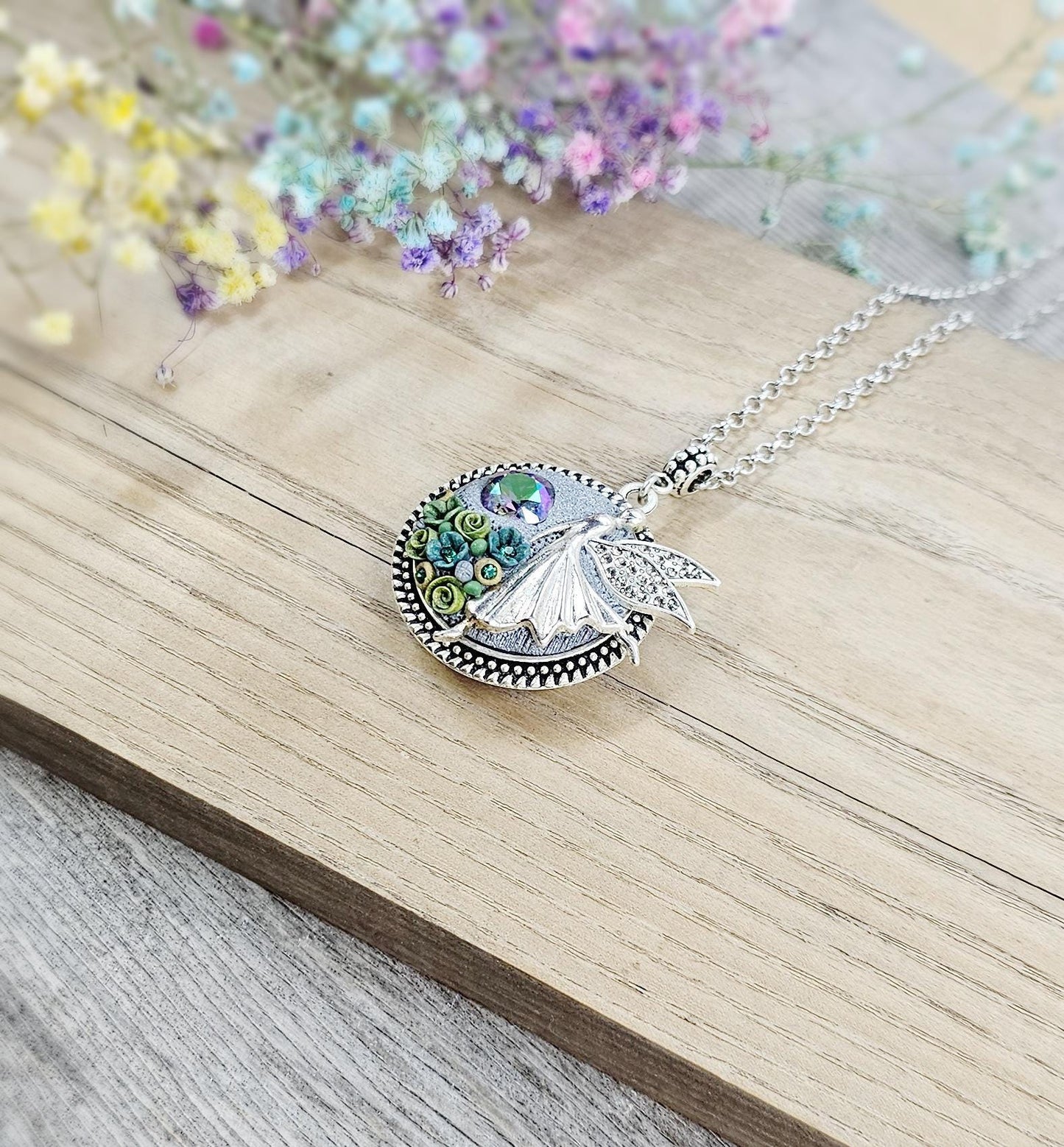 double sided pendant locket for photo or essentiale oil, with fairy angel, crysla, polymer clay green flowers