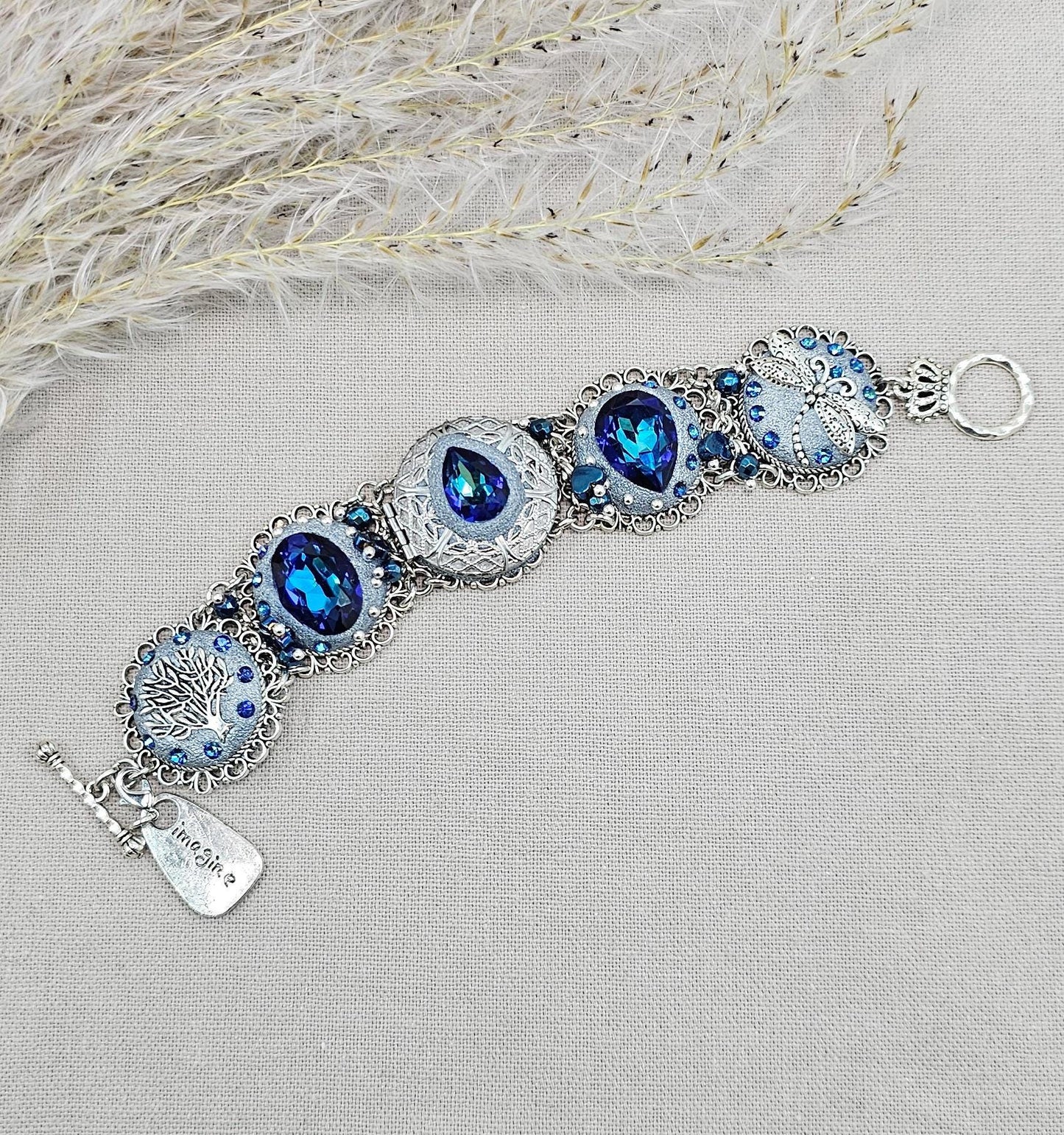 Blue crystal bracelet with polymer clayflowers, locket, dragonfly and tree.polymer clay, polymer bracelet, Clay Bracelet, polymer clay jewelry, Polymer clay beads, Polymer Flowers, Crystal Bracelet