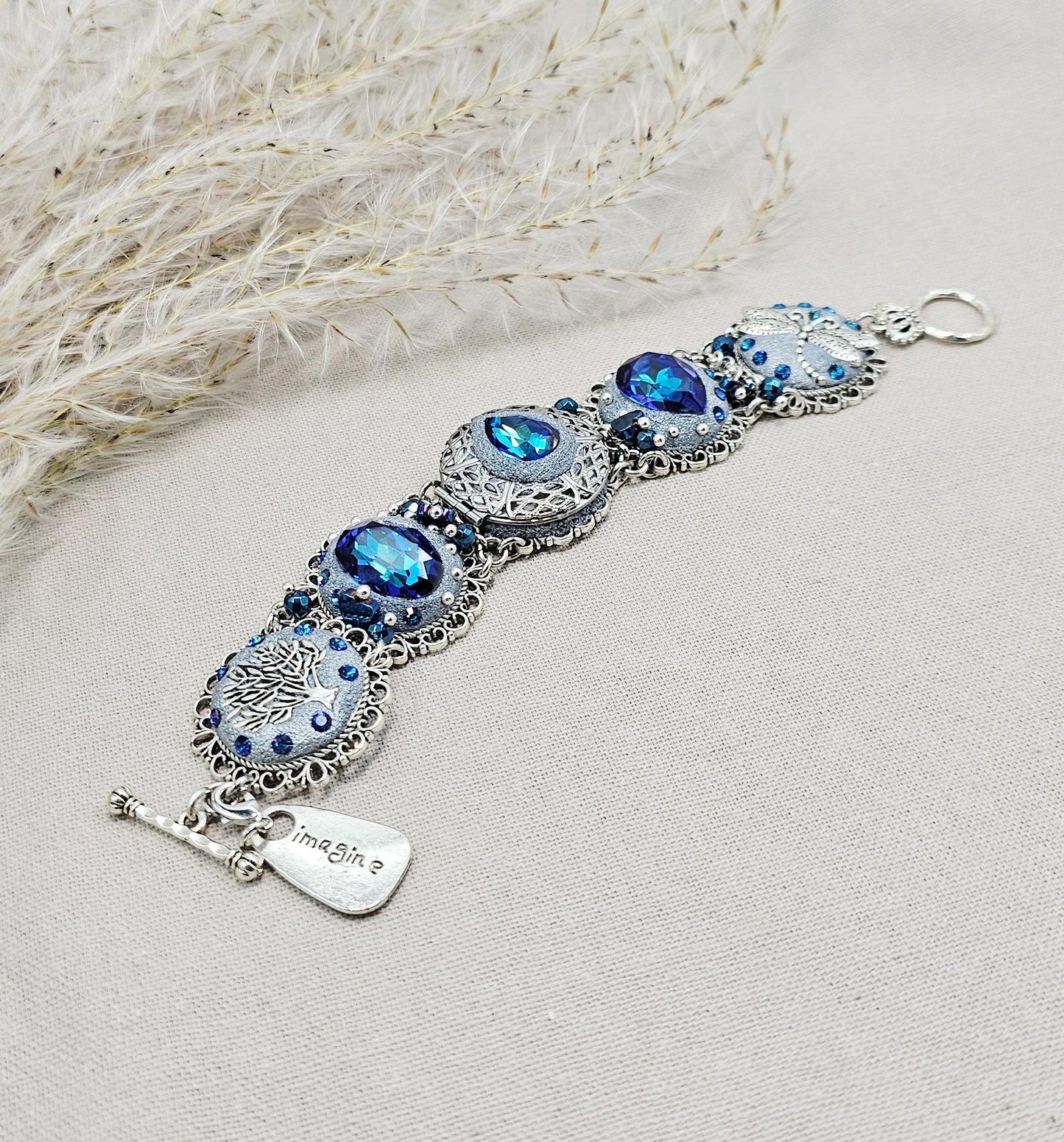 Blue crystal bracelet with polymer clayflowers, locket, dragonfly and tree. polymer clay, polymer bracelet, Clay Bracelet, polymer clay jewelry, Polymer clay beads, Polymer Flowers, Crystal Bracelet