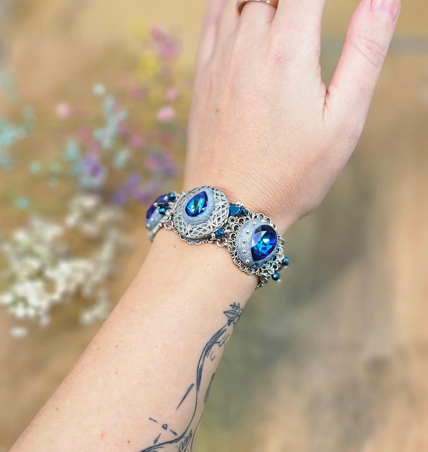 Blue crystal bracelet with polymer clayflowers, locket, dragonfly and tree. polymer clay, polymer bracelet, Clay Bracelet, polymer clay jewelry, Polymer clay beads, Polymer Flowers, Crystal Bracelet
