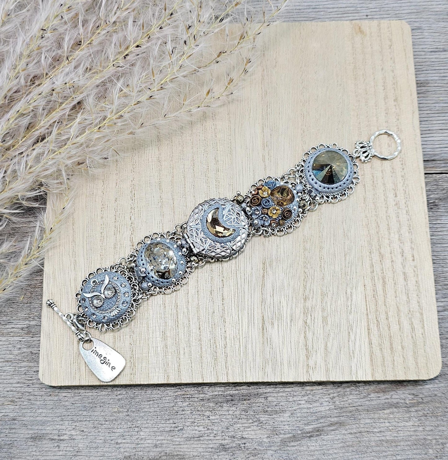 Brown crystal bracelet with locket, owl,moon, polymer clay flowers
