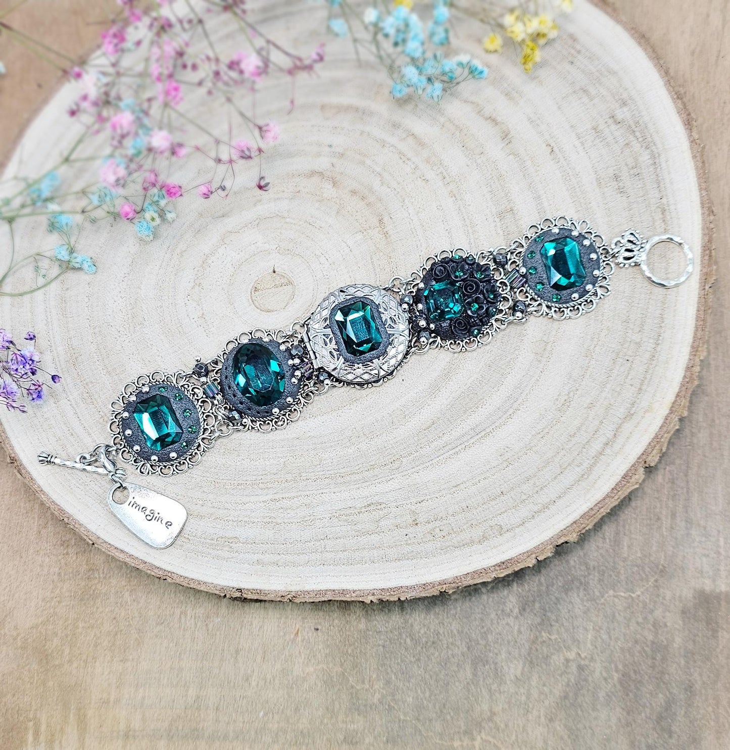 Emerald crystal bracelet with locket, black polymer clay flowers